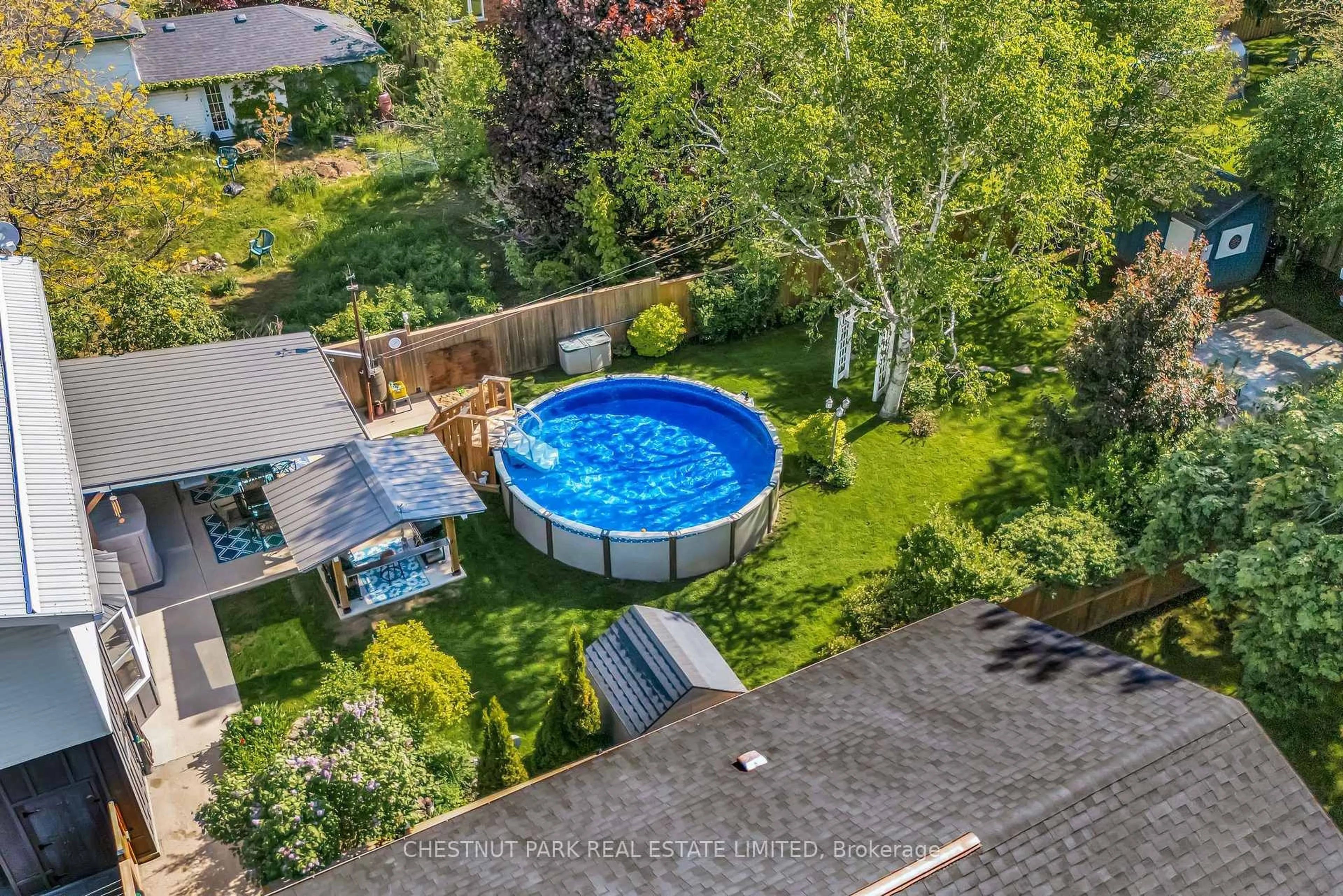 A pic from outside/outdoor area/front of a property/back of a property/a pic from drone, water/lake/river/ocean view for 31 Lake St, Prince Edward County Ontario K0K 2T0