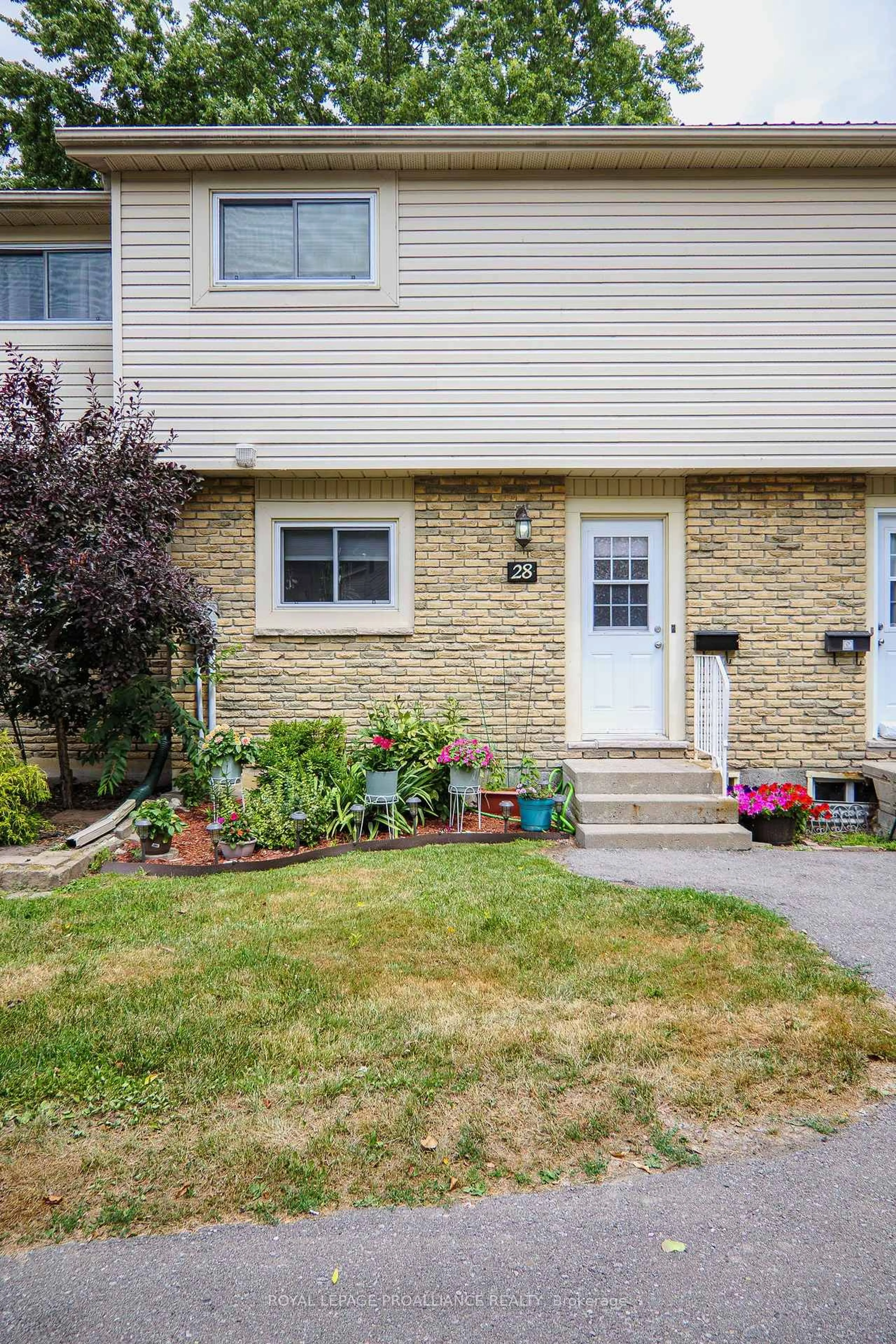 Home with vinyl exterior material, street for 161 Bay St #28, Quinte West Ontario K8V 1H9
