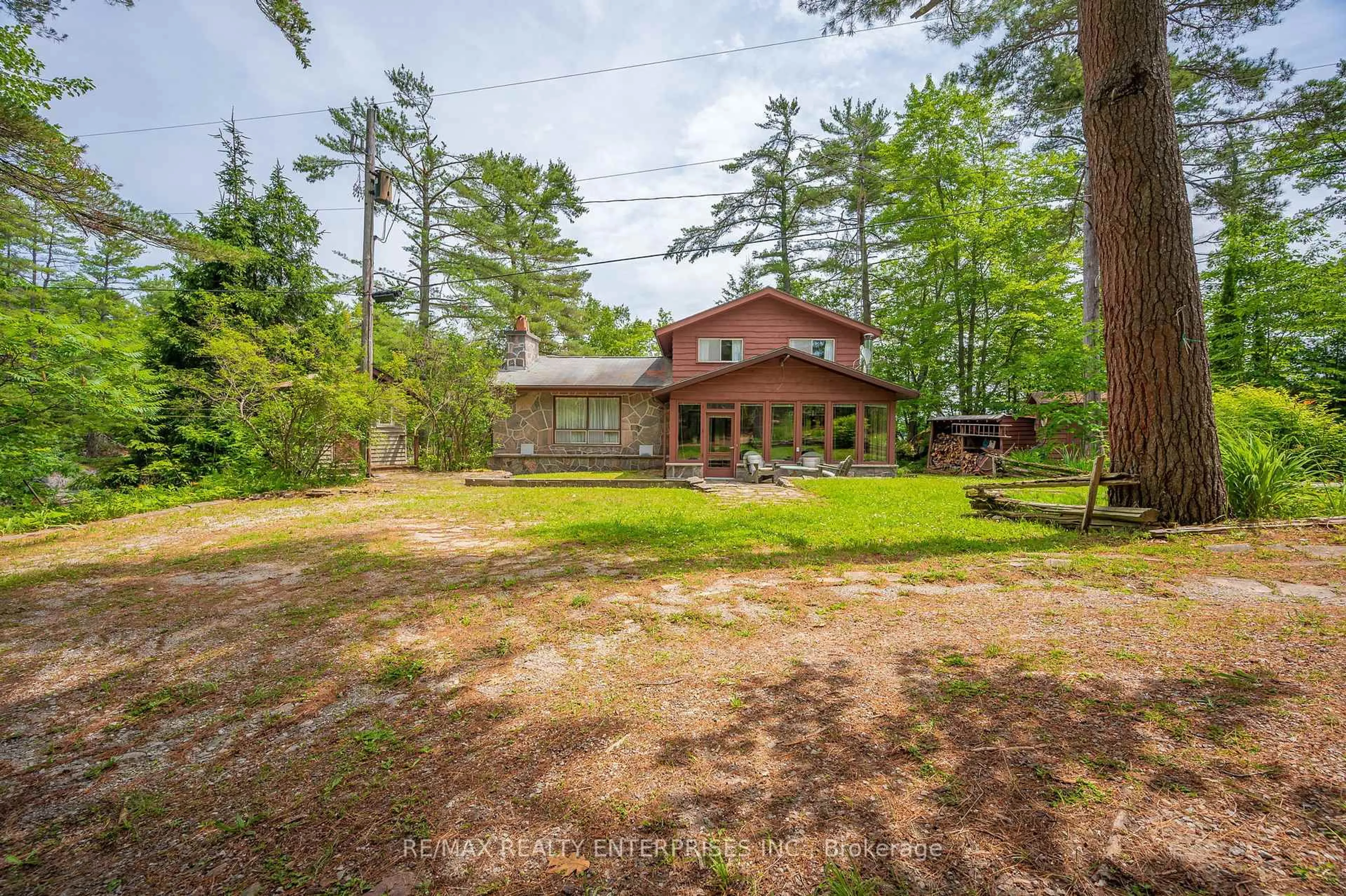 A pic from outside/outdoor area/front of a property/back of a property/a pic from drone, forest/trees view for 179 Crooked Bay Rd, Georgian Bay Ontario L0K 1S0