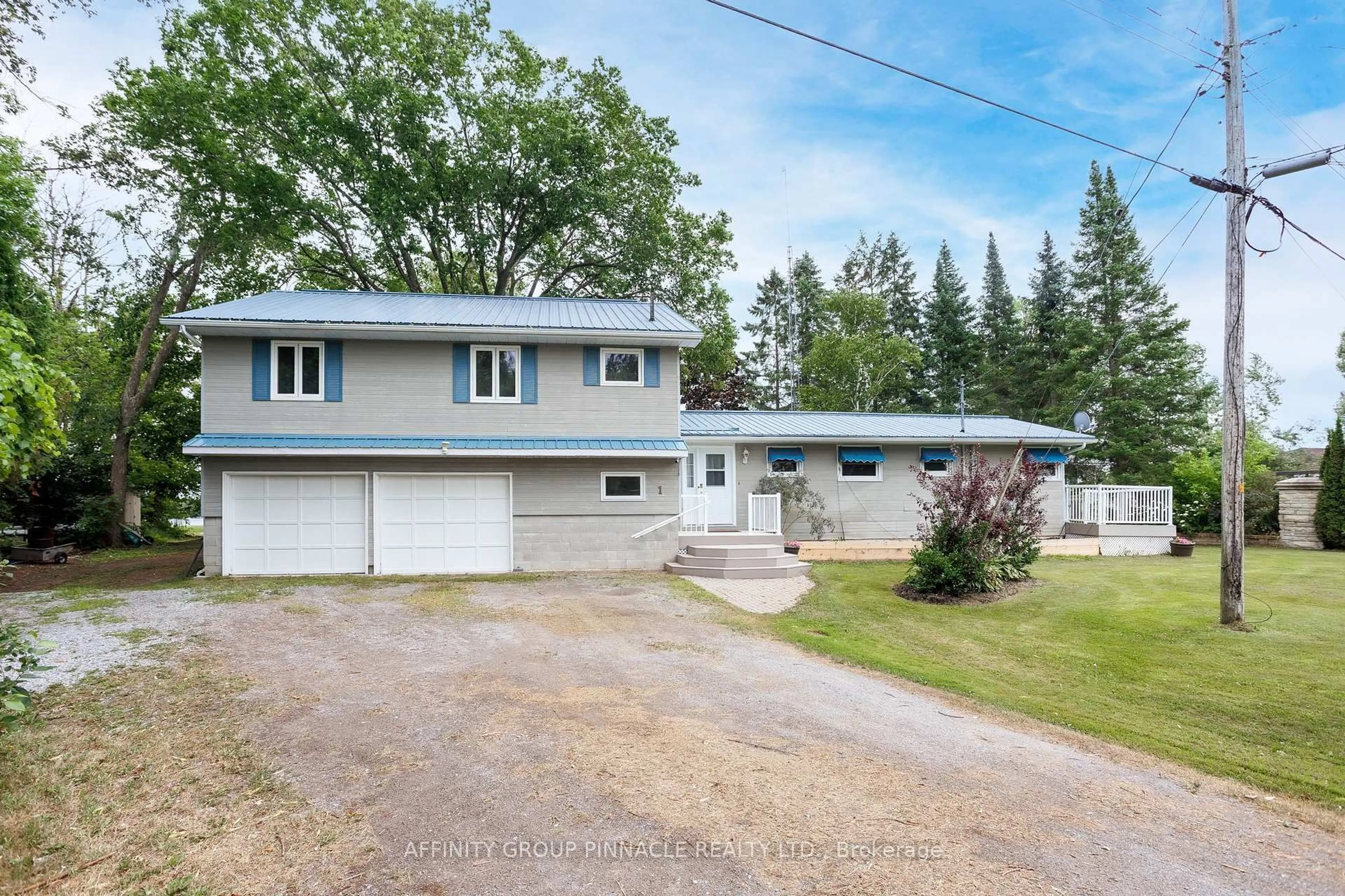 A pic from outside/outdoor area/front of a property/back of a property/a pic from drone, street for 1 Beatrice Dr, Kawartha Lakes Ontario K0M 1N0