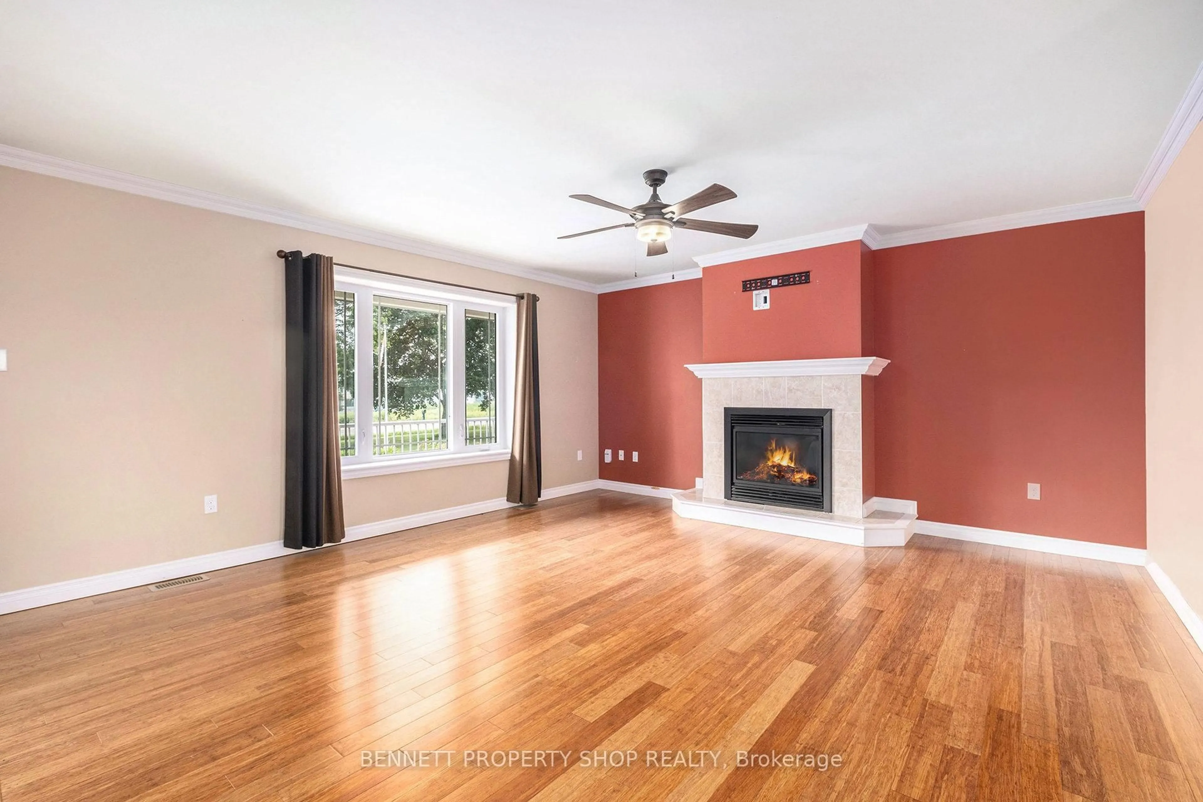 Living room with furniture, wood/laminate floor for 2002 County Road 2 Rd, Edwardsburgh/Cardinal Ontario K0E 1T1