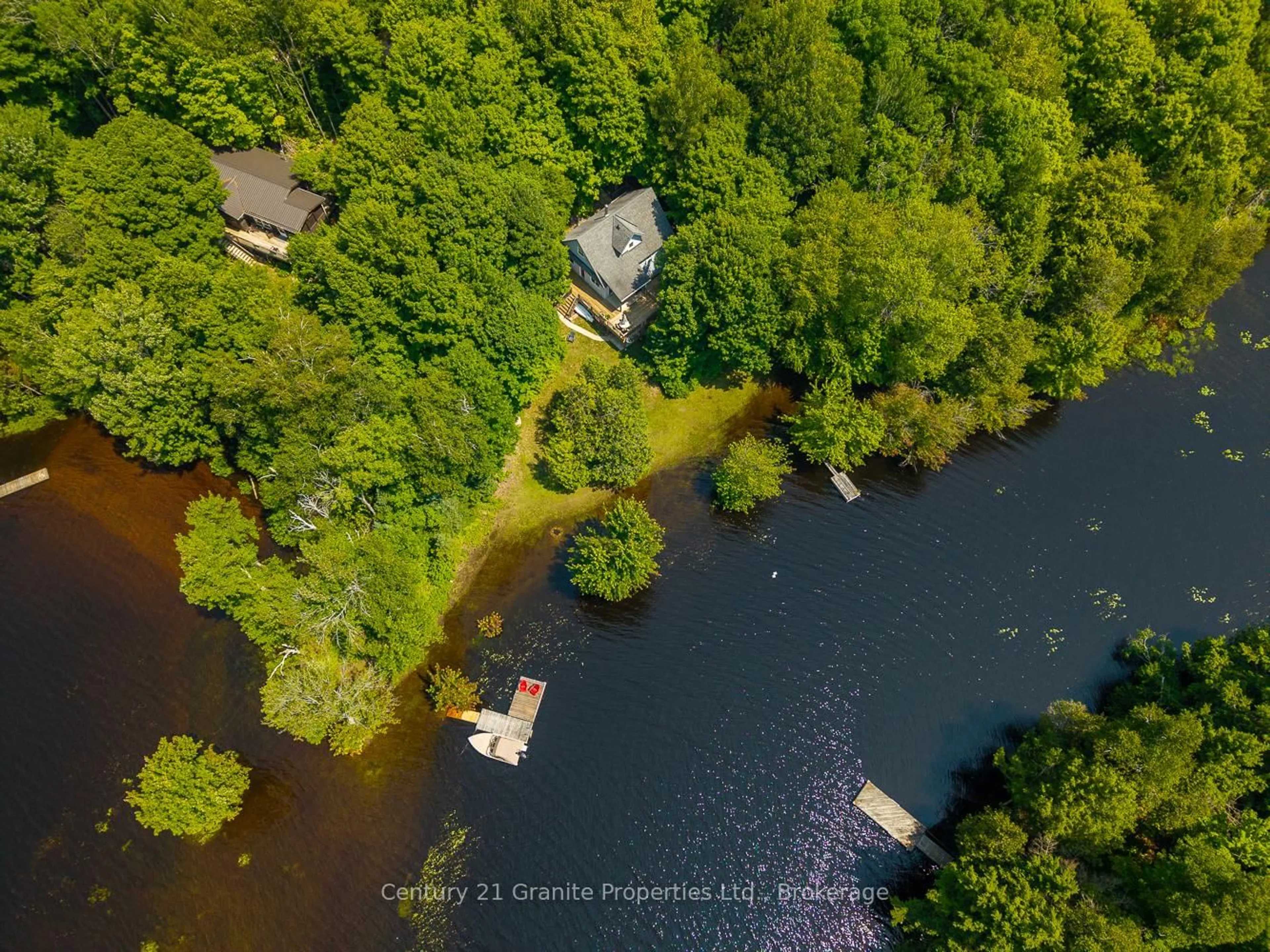 A pic from outside/outdoor area/front of a property/back of a property/a pic from drone, water/lake/river/ocean view for 9 Sykes Lane, Whitestone Ontario P0A 1G0
