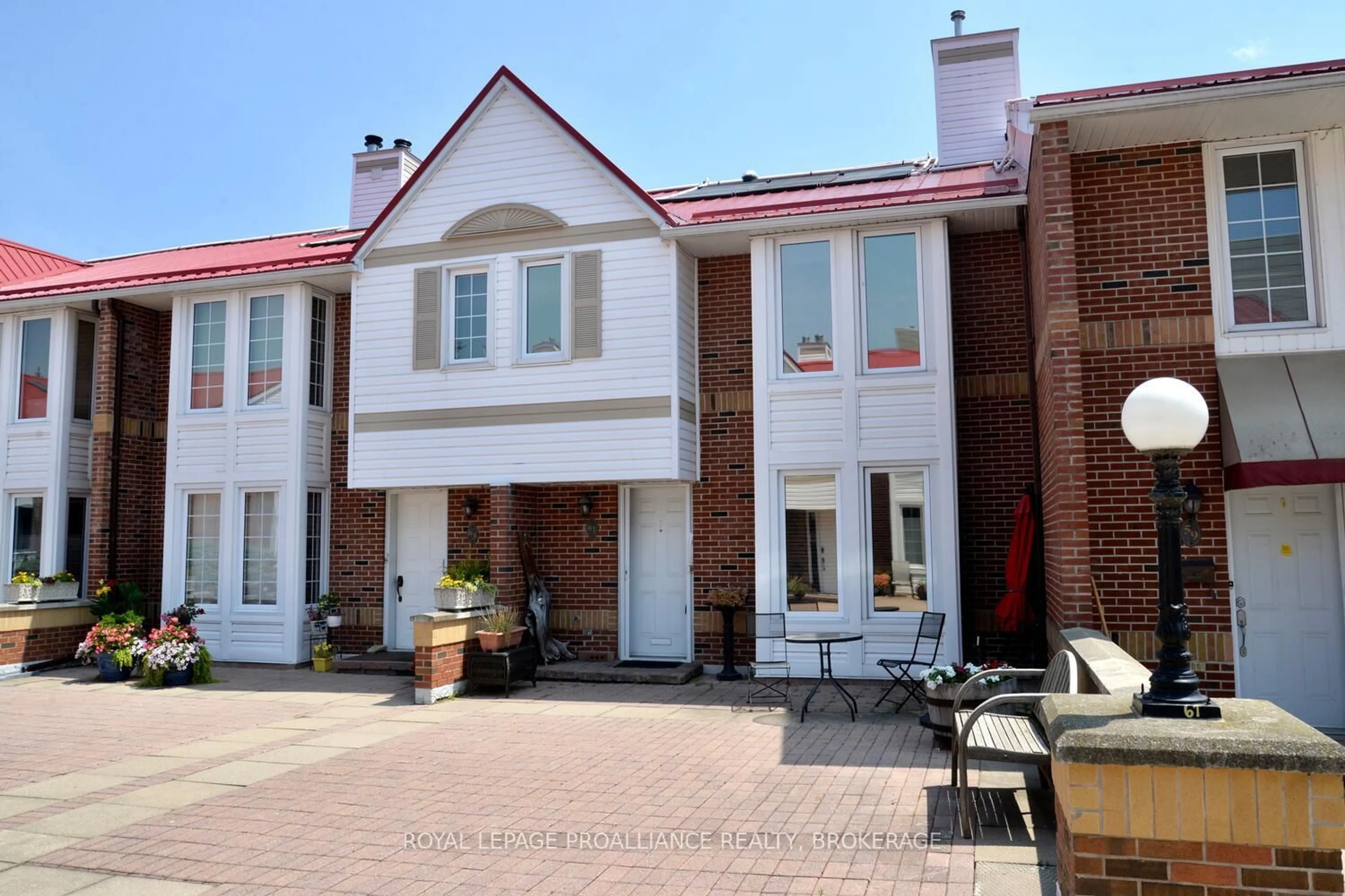 Home with brick exterior material, street for 1 Place D'Armes #61, Kingston Ontario K7K 6S3