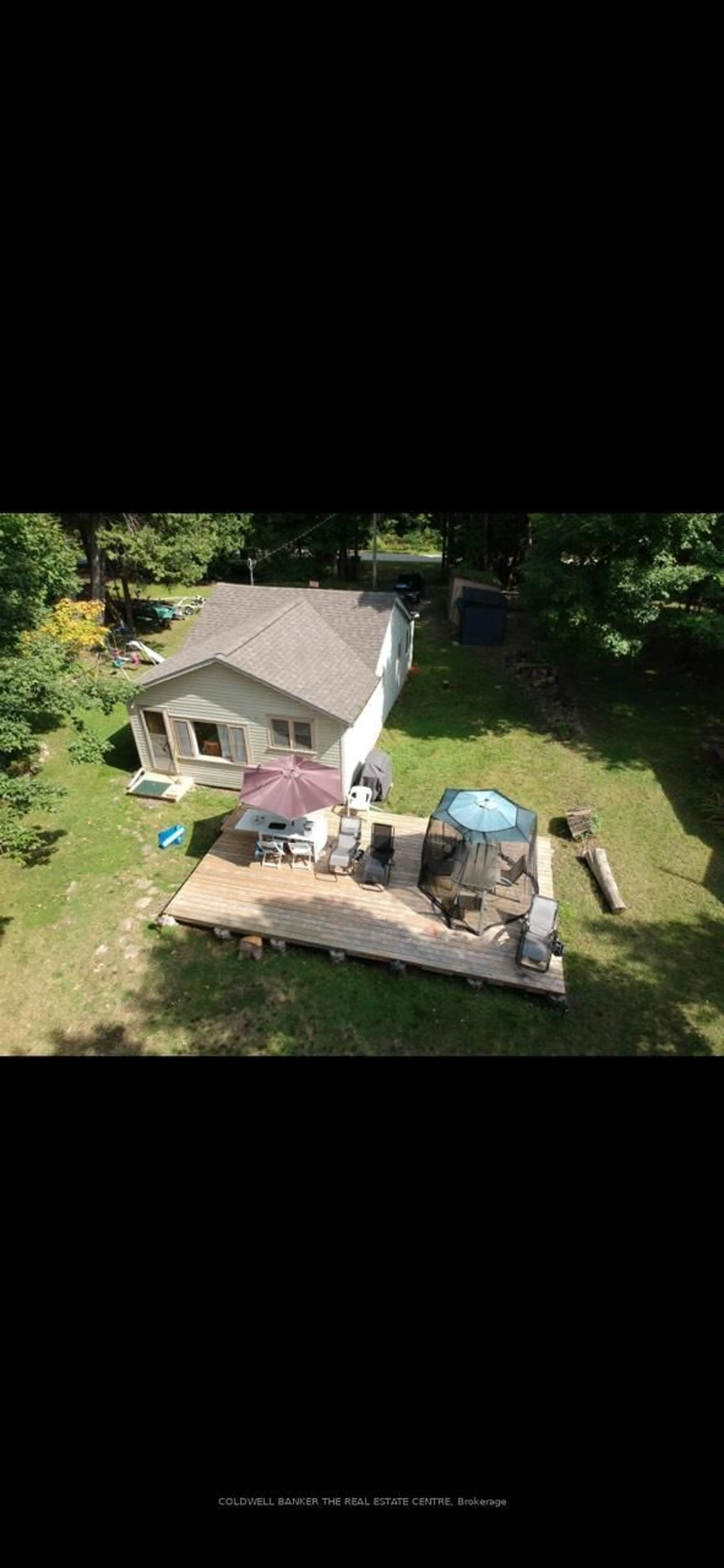 A pic from outside/outdoor area/front of a property/back of a property/a pic from drone, water/lake/river/ocean view for 227 Sunset Beach Rd, Kawartha Lakes Ontario K0M 2B0