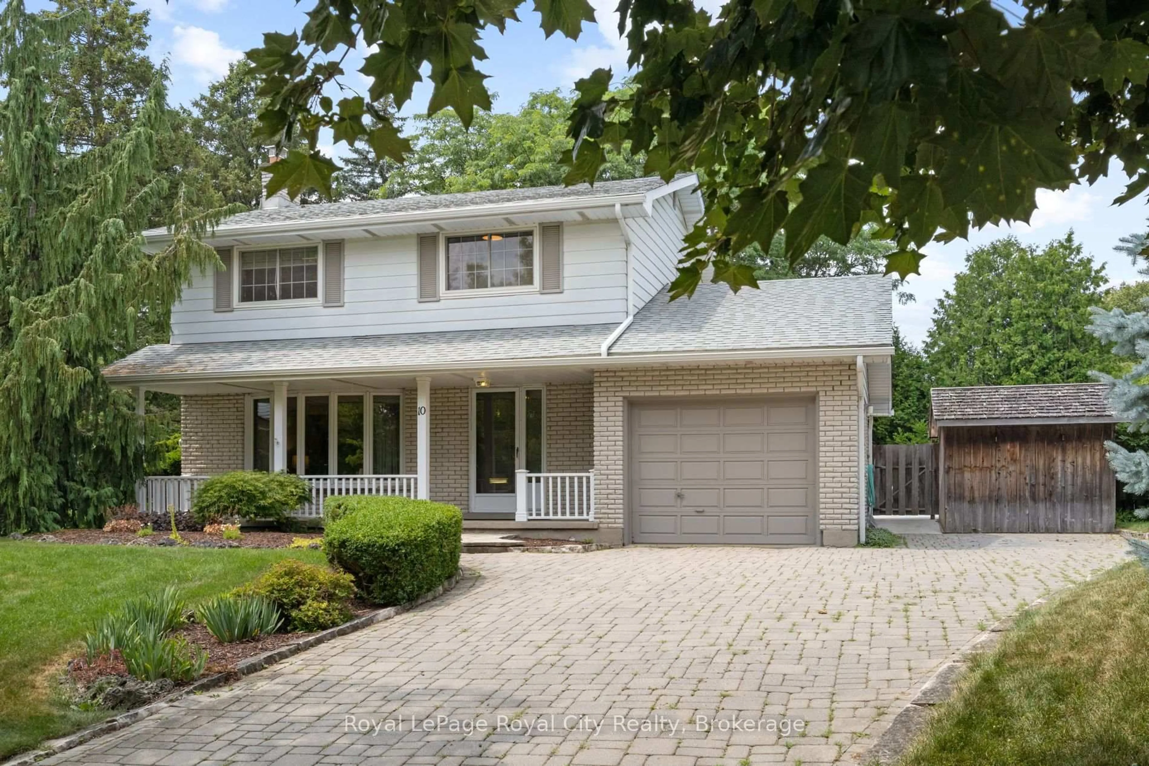 Home with brick exterior material, street for 10 Eton Pl, Guelph Ontario N1E 3L5