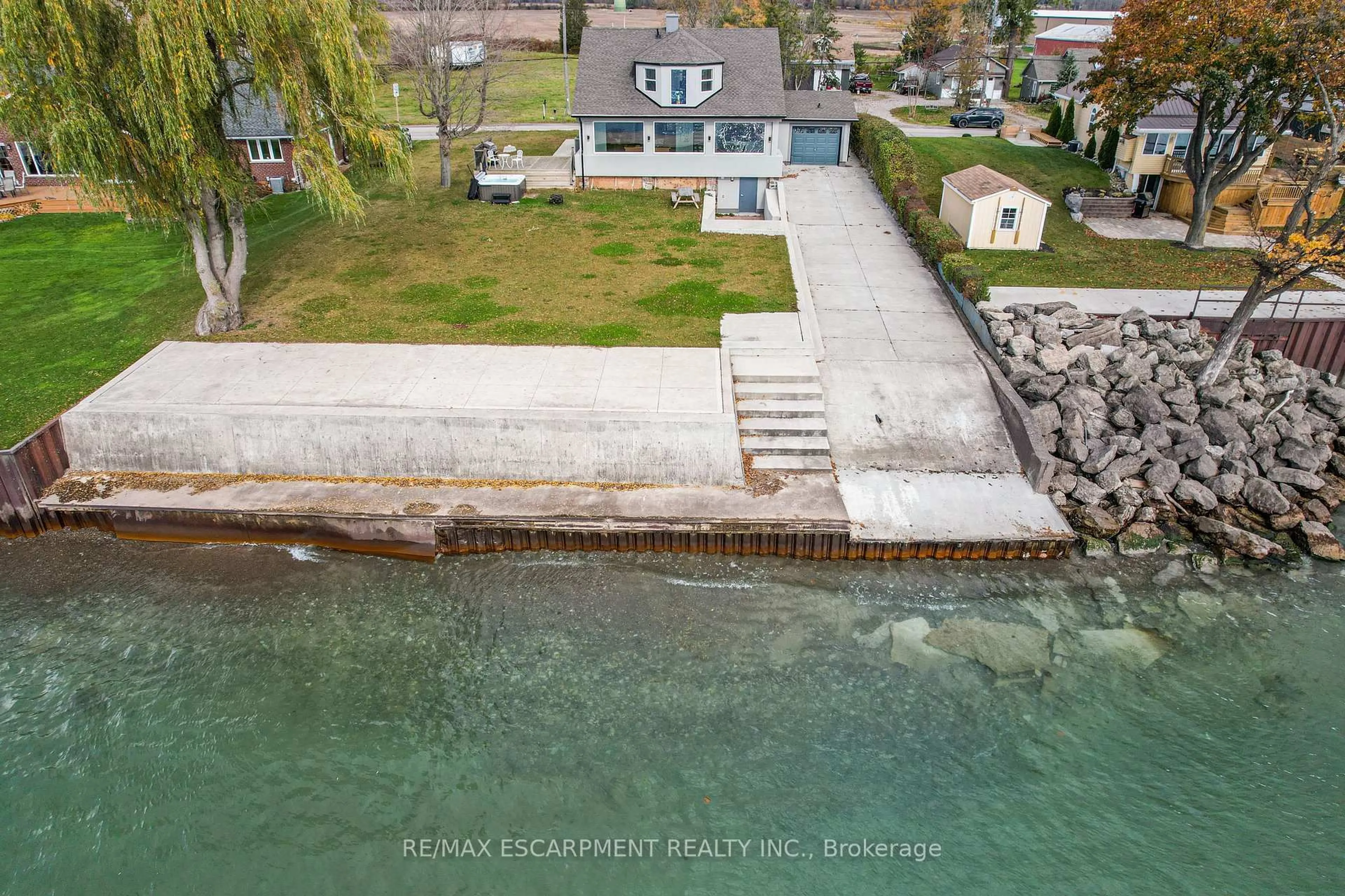A pic from outside/outdoor area/front of a property/back of a property/a pic from drone, water/lake/river/ocean view for 2952 North Shore Dr, Haldimand Ontario N0A 1K0