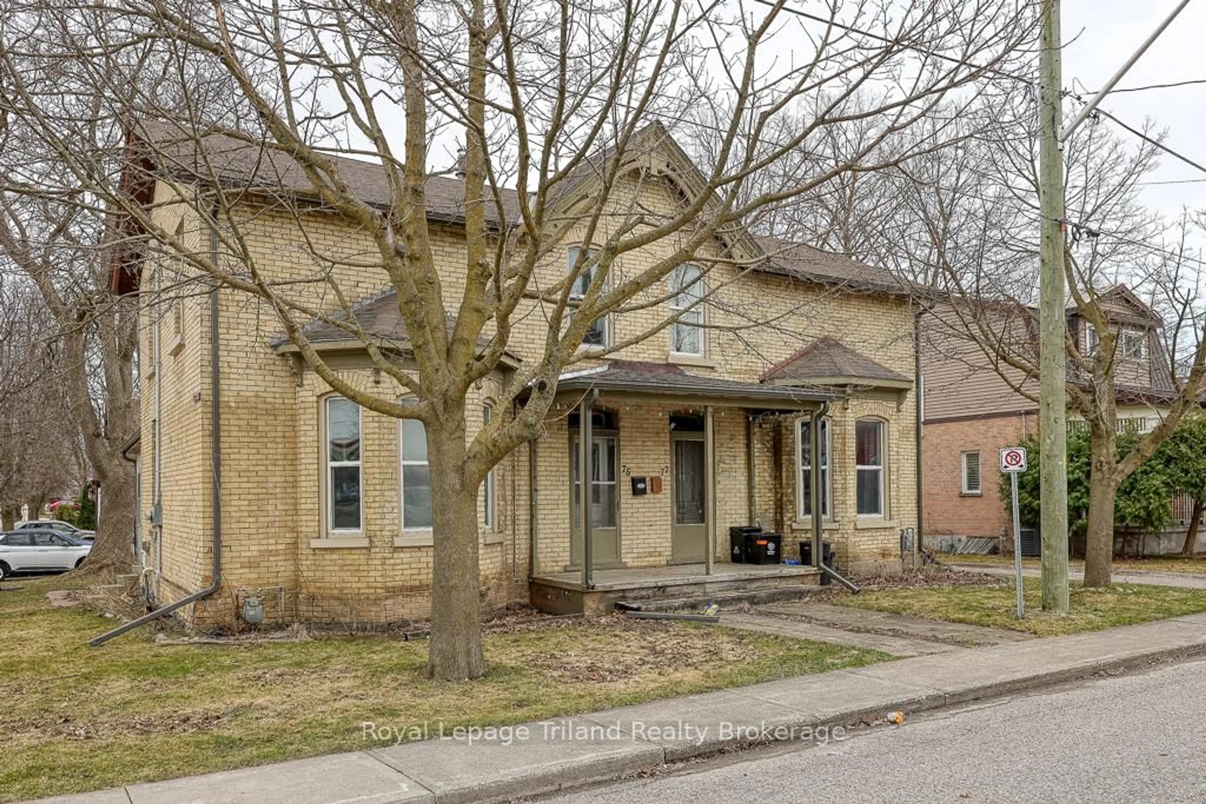 Home with brick exterior material, street for 75 & 77 Reeve St, Woodstock Ontario N4S 3G7