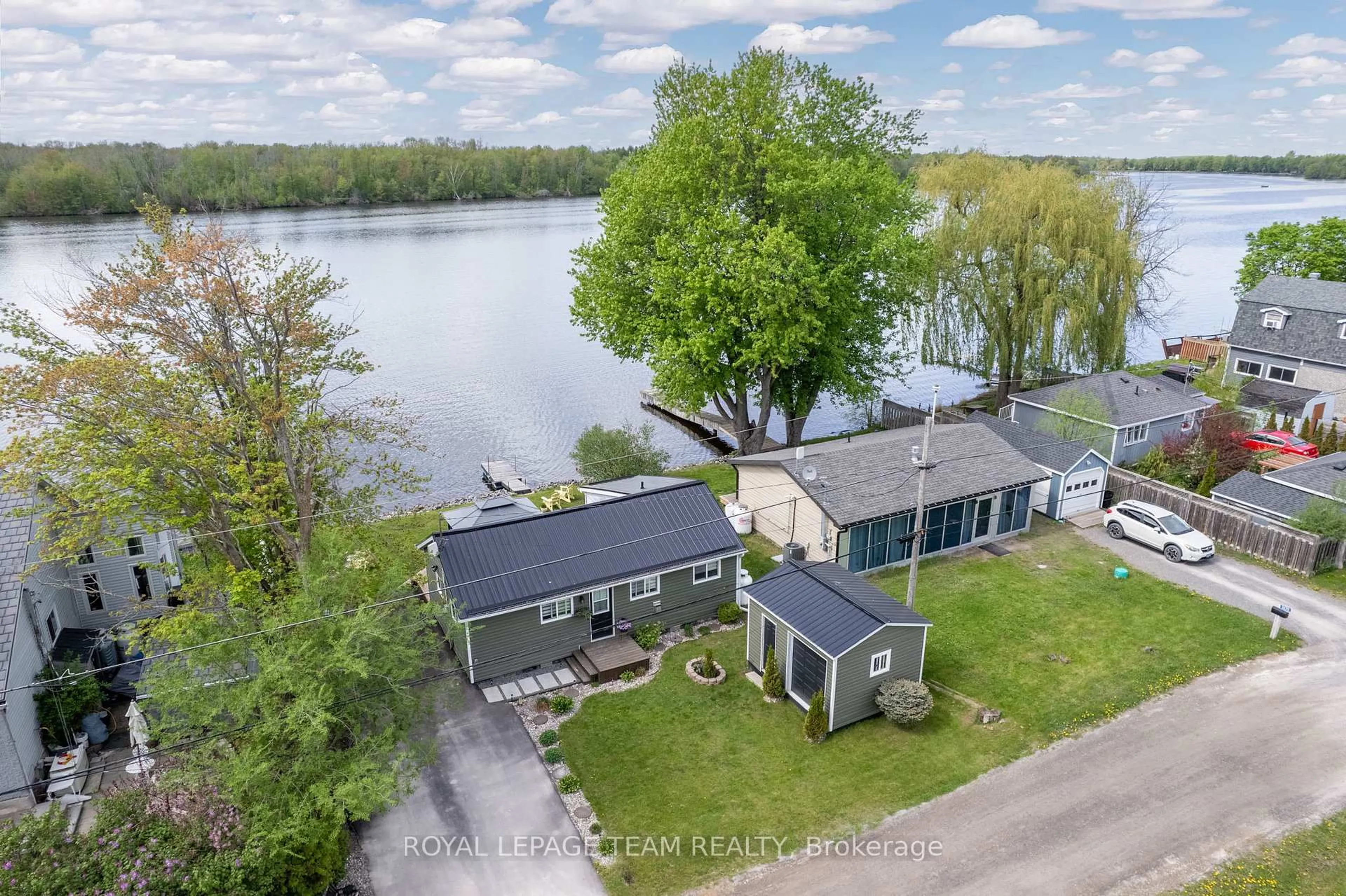 A pic from outside/outdoor area/front of a property/back of a property/a pic from drone, water/lake/river/ocean view for 3872 Lannin Lane, North Grenville Ontario K0G 1J0