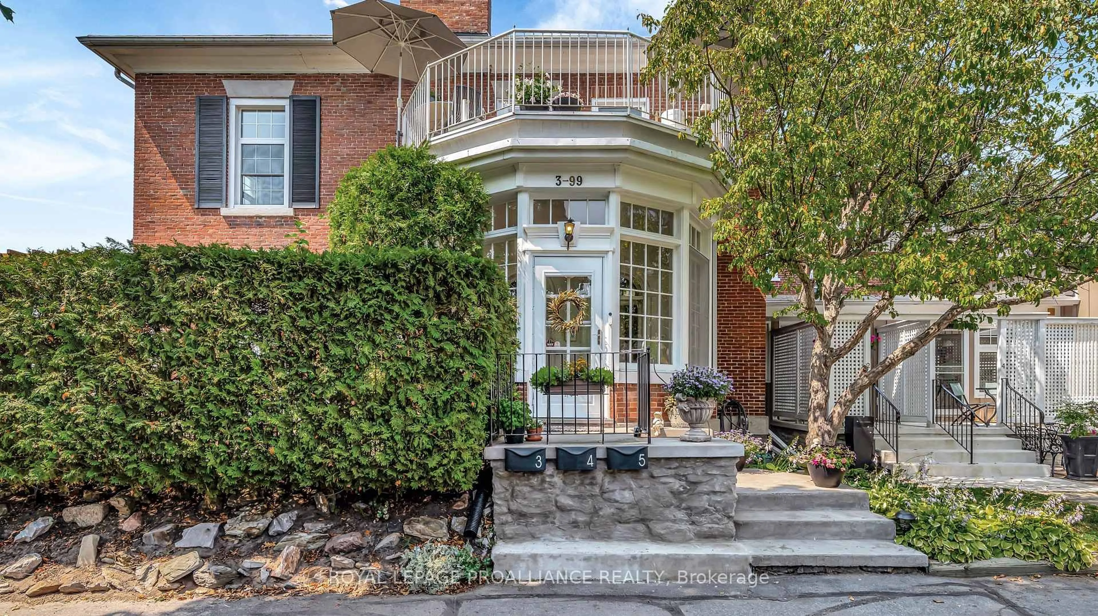Home with brick exterior material, street for 99 Bridge St #3, Belleville Ontario K8N 1M2