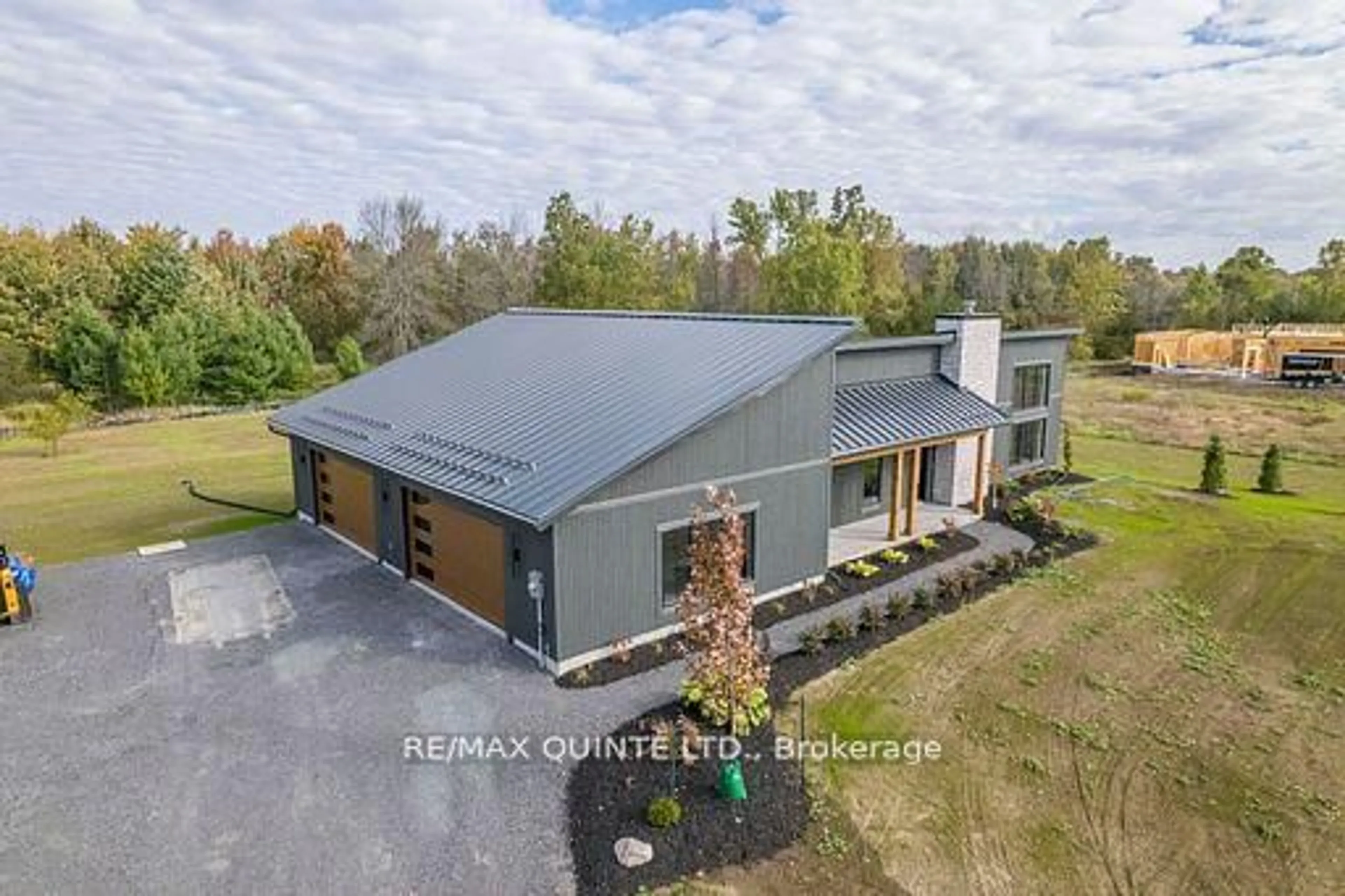 A pic from outside/outdoor area/front of a property/back of a property/a pic from drone, building for 225 Mitchells Crossroad, Prince Edward County Ontario K0K 2T0