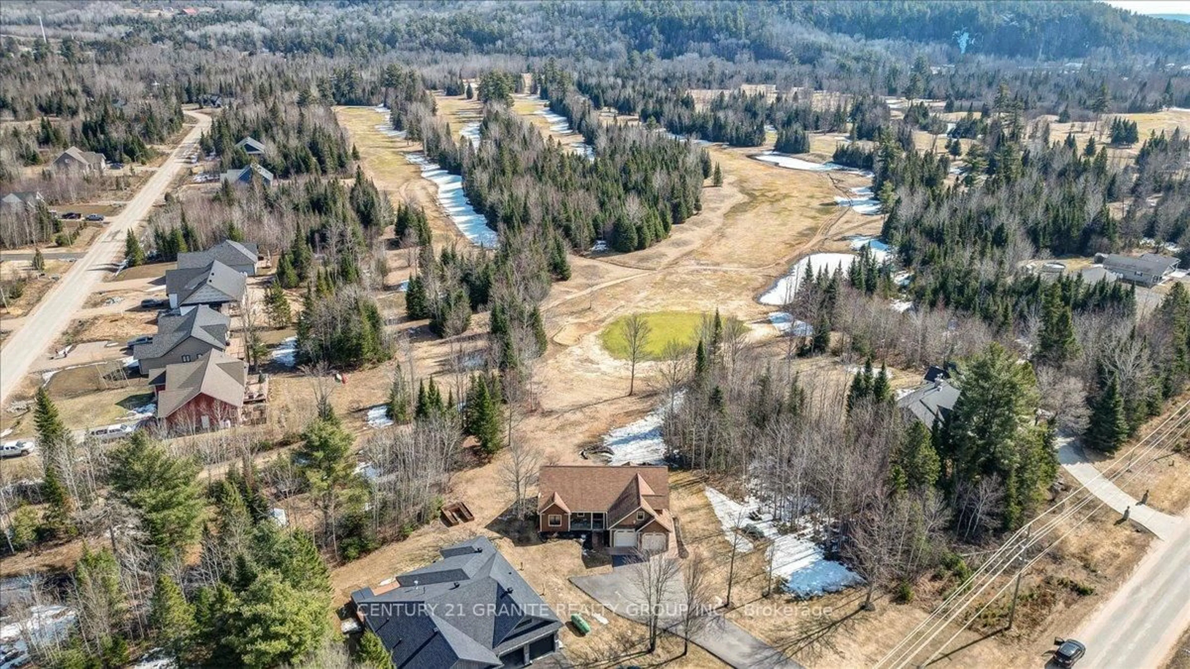A pic from outside/outdoor area/front of a property/back of a property/a pic from drone, forest/trees view for 52 Nicklaus Dr, Bancroft Ontario K0L 1C0