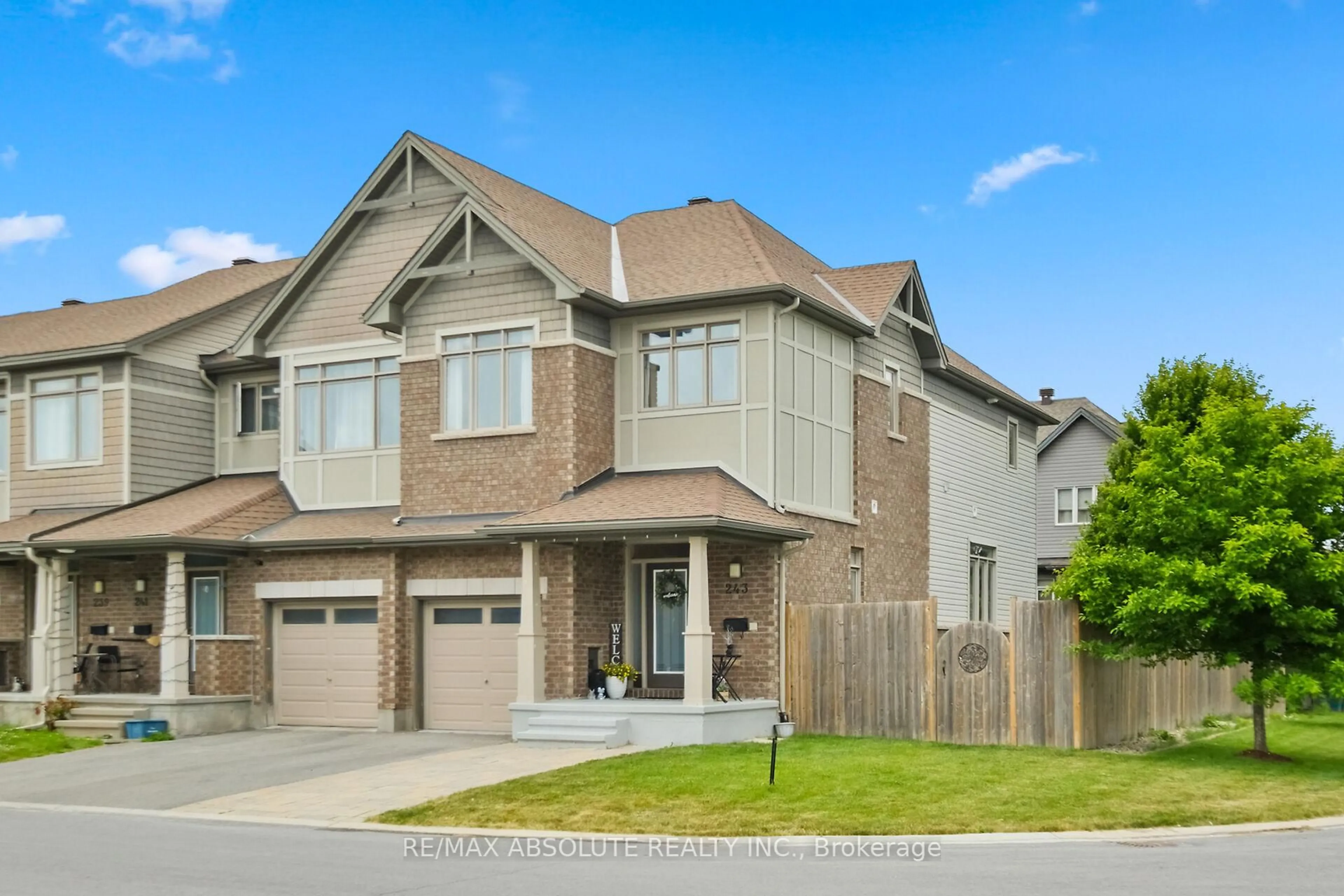 Home with brick exterior material, street for 243 Overberg Way, Ottawa Ontario K2S 0V8