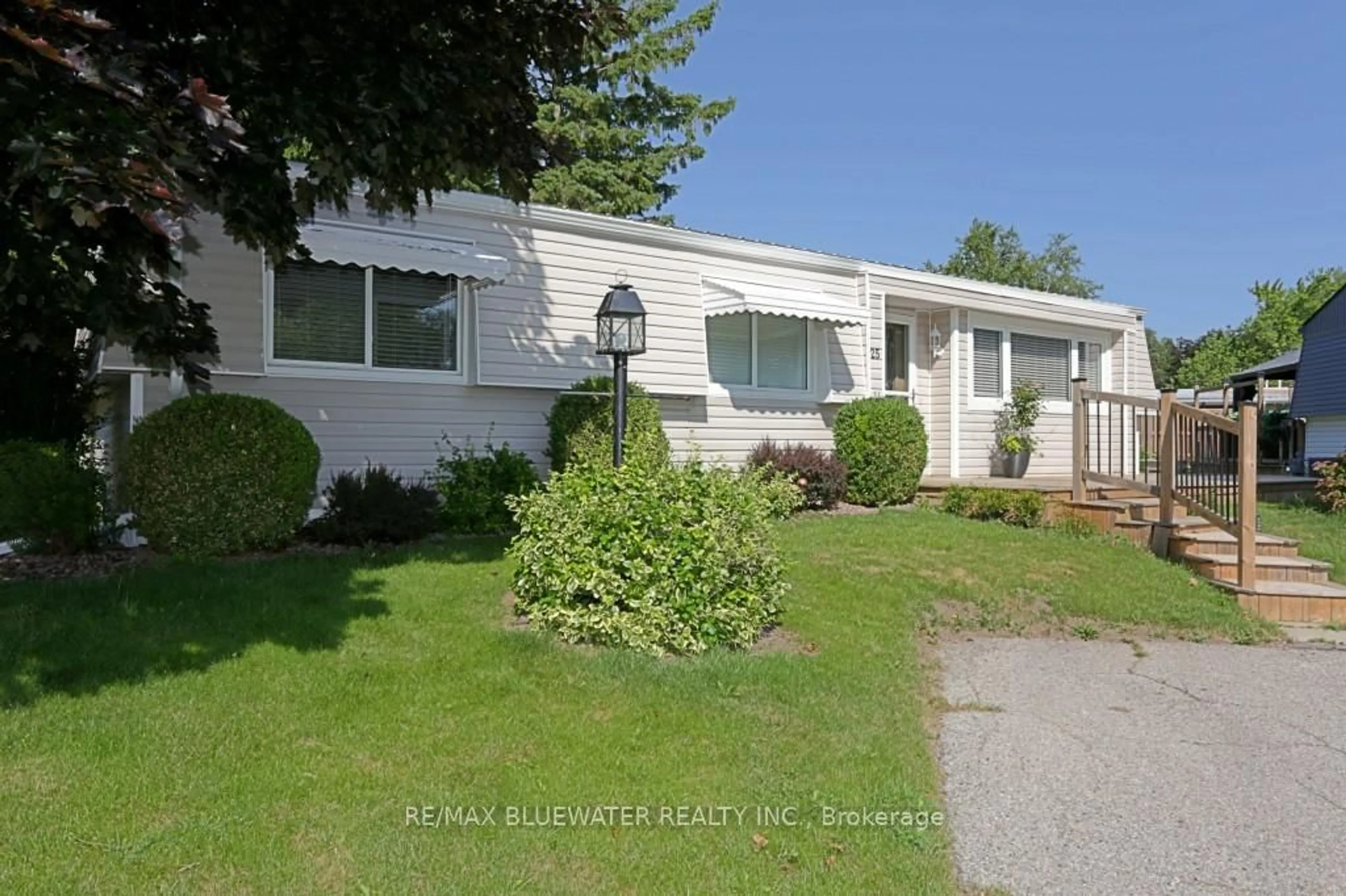 Home with vinyl exterior material, street for 25 Maple Grove Crt, South Huron Ontario N0M 1T0
