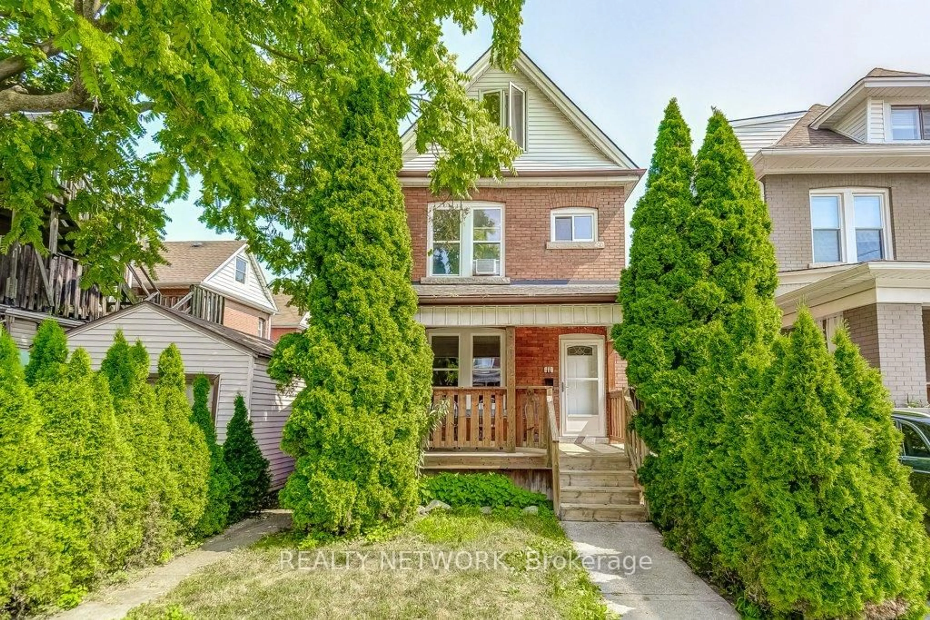Home with brick exterior material, street for 11 Elm St, Hamilton Ontario L8M 1Y2