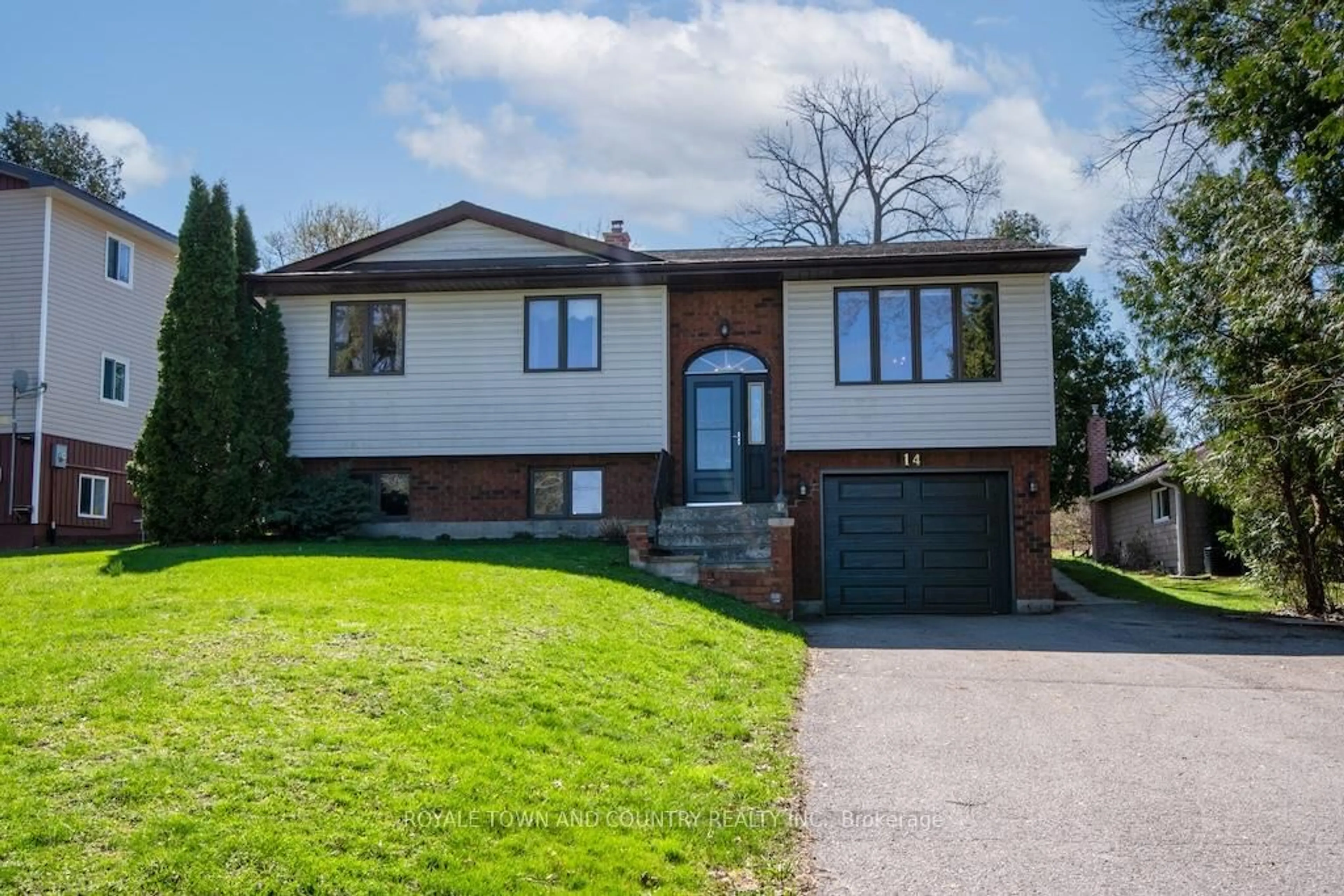 Home with brick exterior material, street for 14 McGill Dr, Kawartha Lakes Ontario L0B 1K0