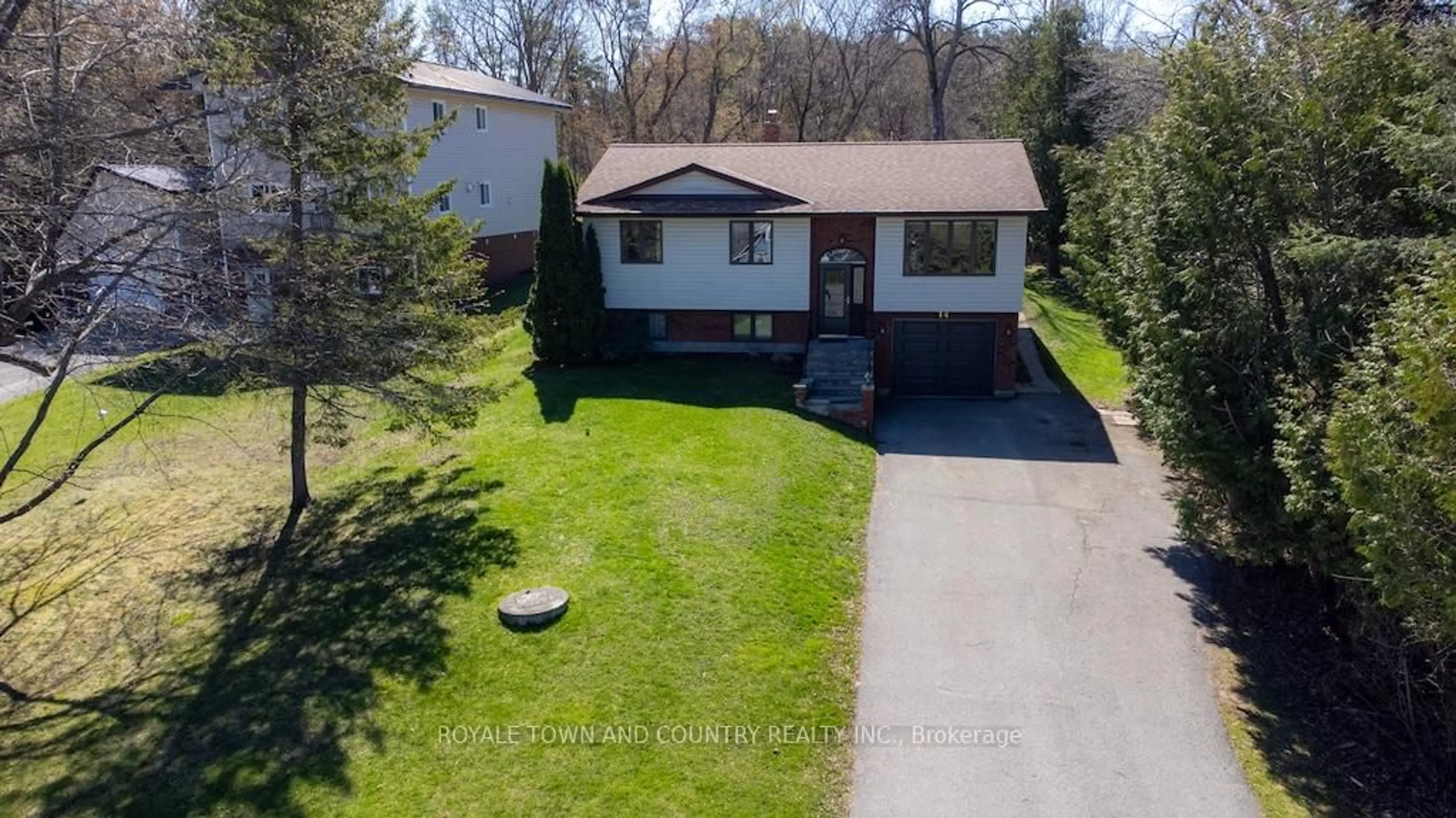 A pic from outside/outdoor area/front of a property/back of a property/a pic from drone, street for 14 McGill Dr, Kawartha Lakes Ontario L0B 1K0