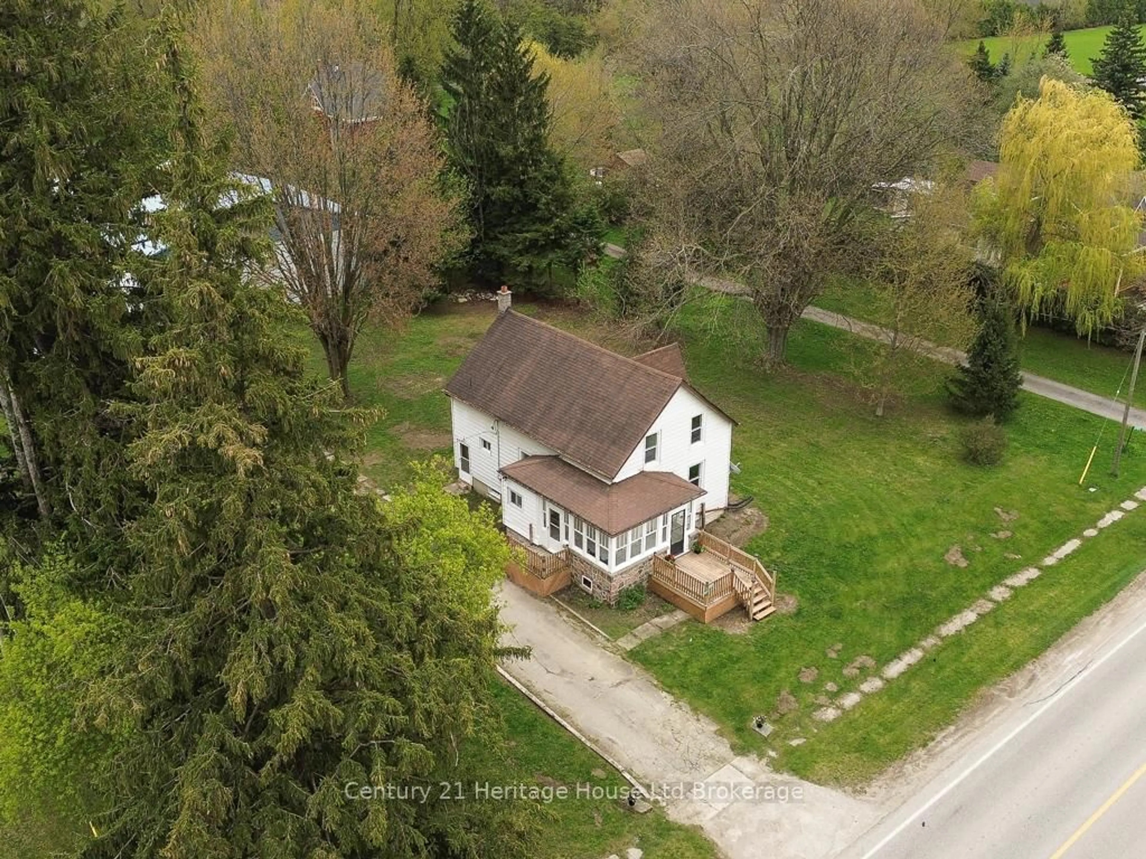 A pic from outside/outdoor area/front of a property/back of a property/a pic from drone, street for 4597 Perth County Rd 135 Rd, Perth East Ontario N0K 1X0