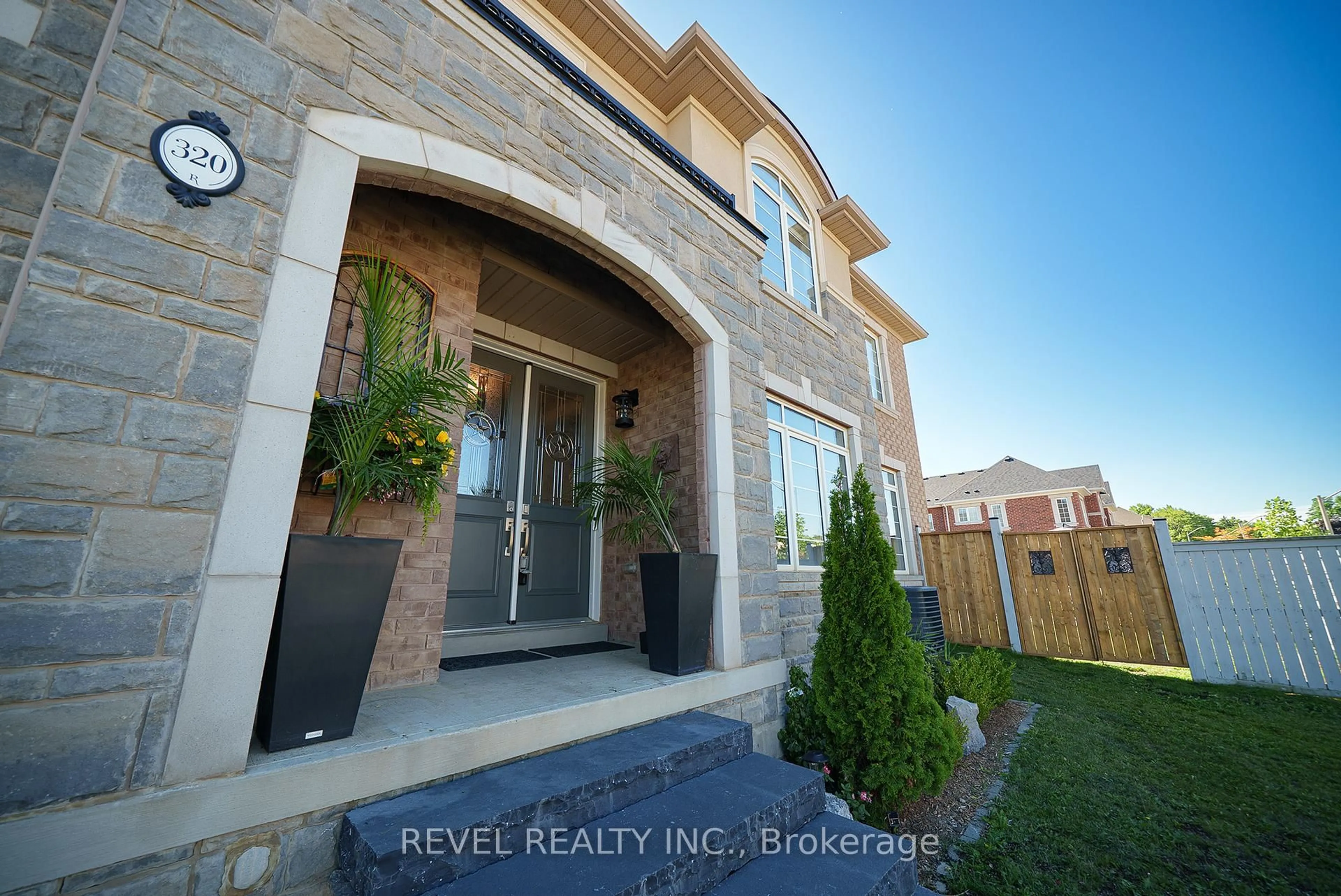 Home with brick exterior material, street for 320 Raymond Rd, Hamilton Ontario L9K 0J8