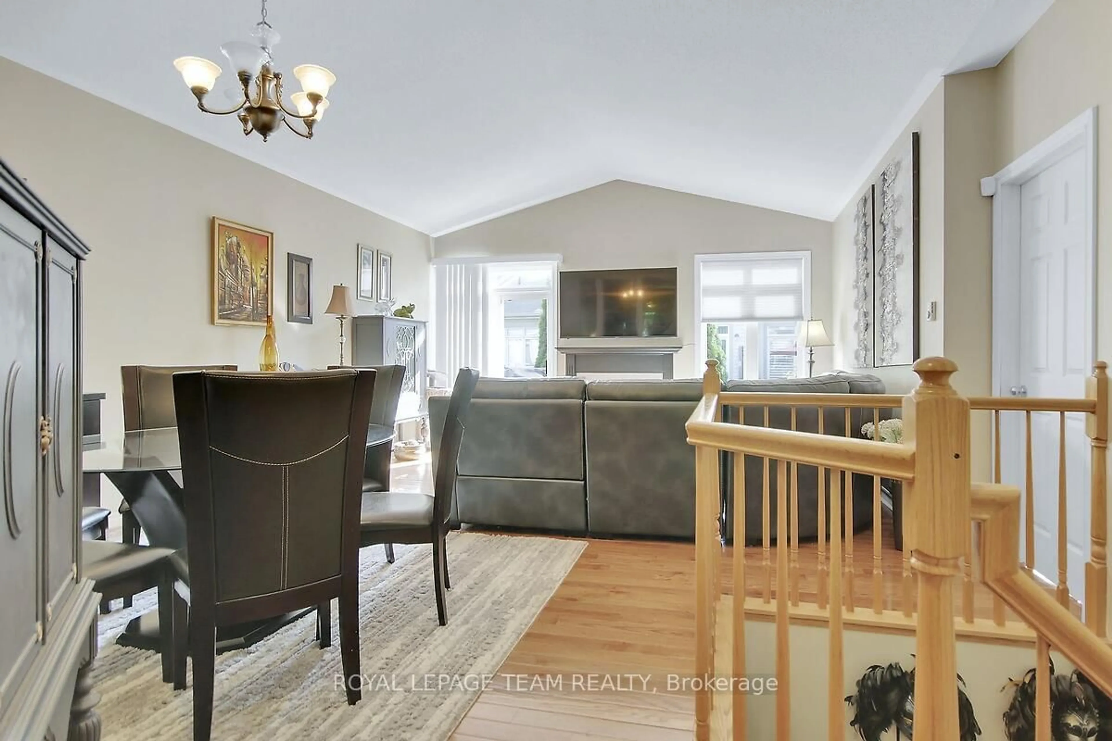 Living room with furniture, wood/laminate floor for 48 Village Walk, Manotick Ontario K4M 1L1