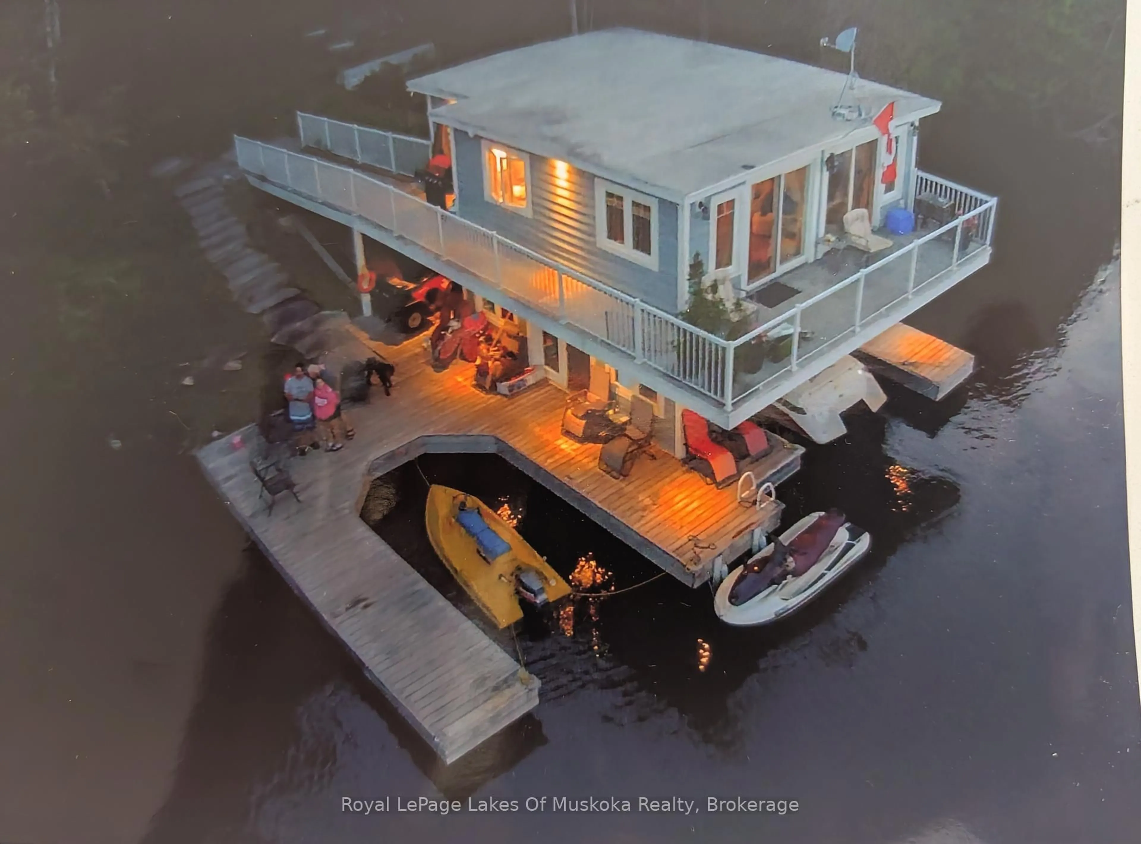A pic from outside/outdoor area/front of a property/back of a property/a pic from drone, water/lake/river/ocean view for 1024/1025 White Pines Rd, Lake of Bays Ontario P1H 2J3