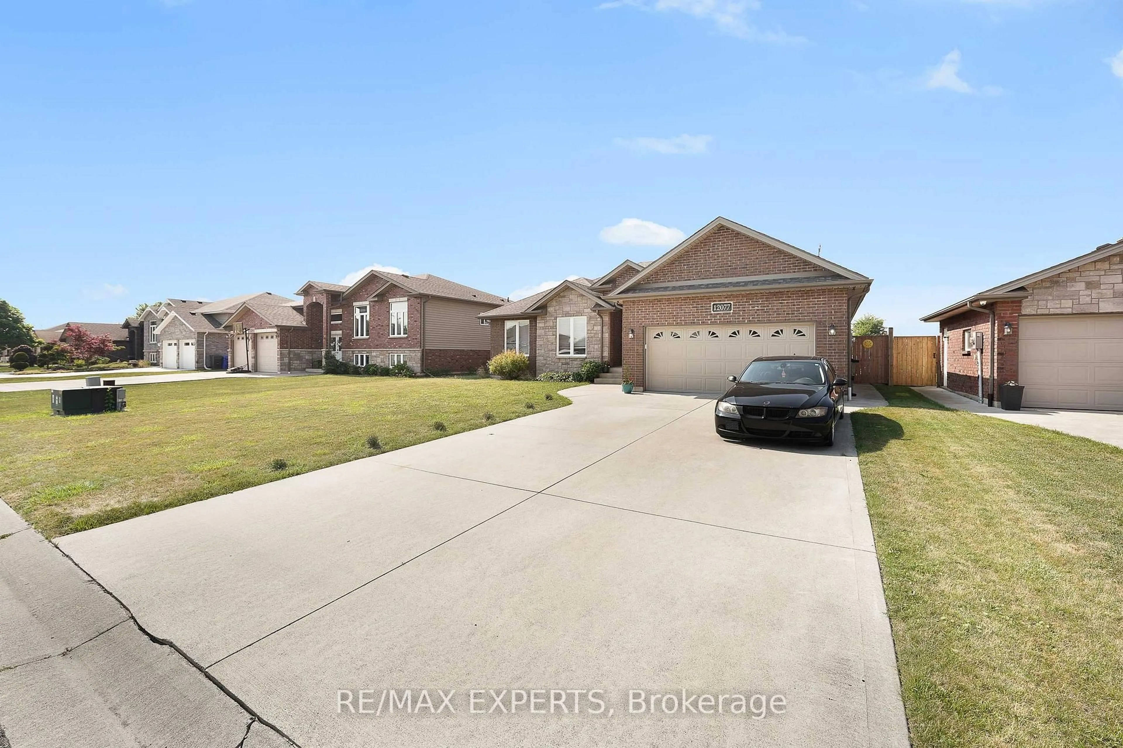 A pic from outside/outdoor area/front of a property/back of a property/a pic from drone, street for 12077 Ducharme Lane, Essex Ontario N0R 1J0