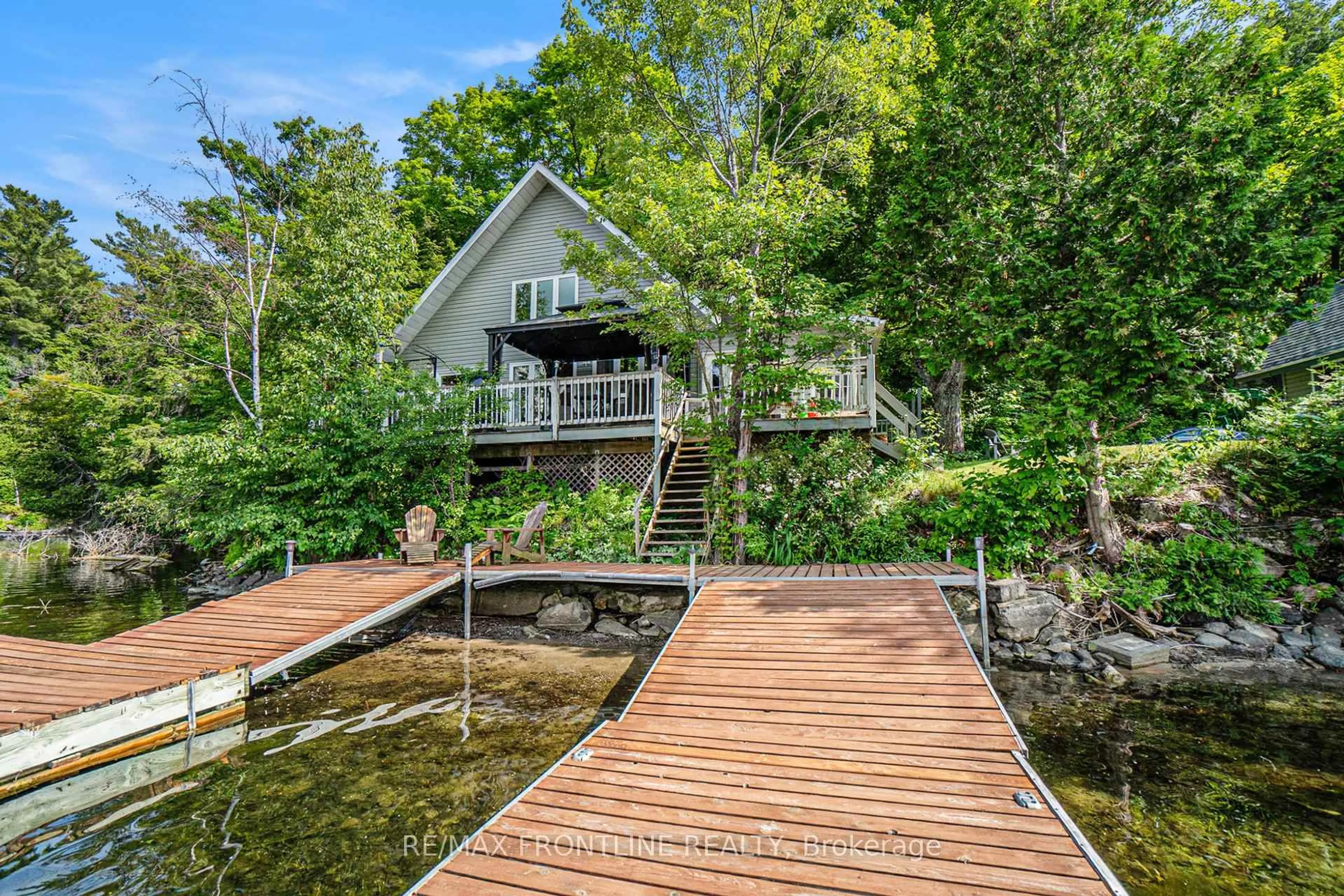 A pic from outside/outdoor area/front of a property/back of a property/a pic from drone, water/lake/river/ocean view for 544 Christie Lake Ln 51A Lane, Maberly Ontario K0H 2B0