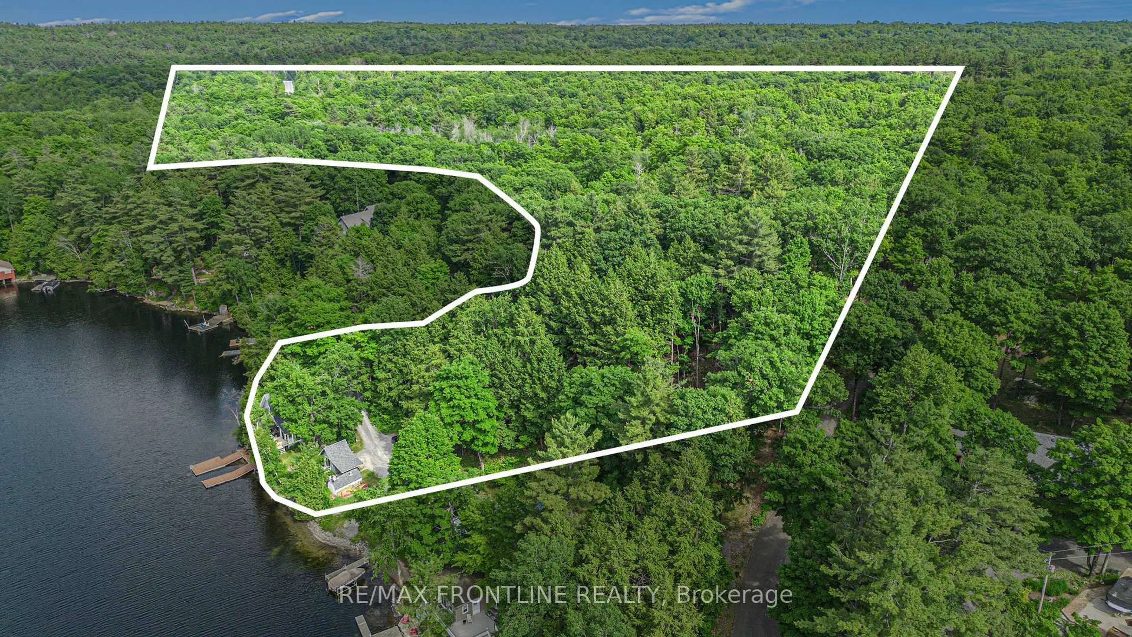 A pic from outside/outdoor area/front of a property/back of a property/a pic from drone, water/lake/river/ocean view for 544 Christie Lake Ln 51A Lane, Maberly Ontario K0H 2B0