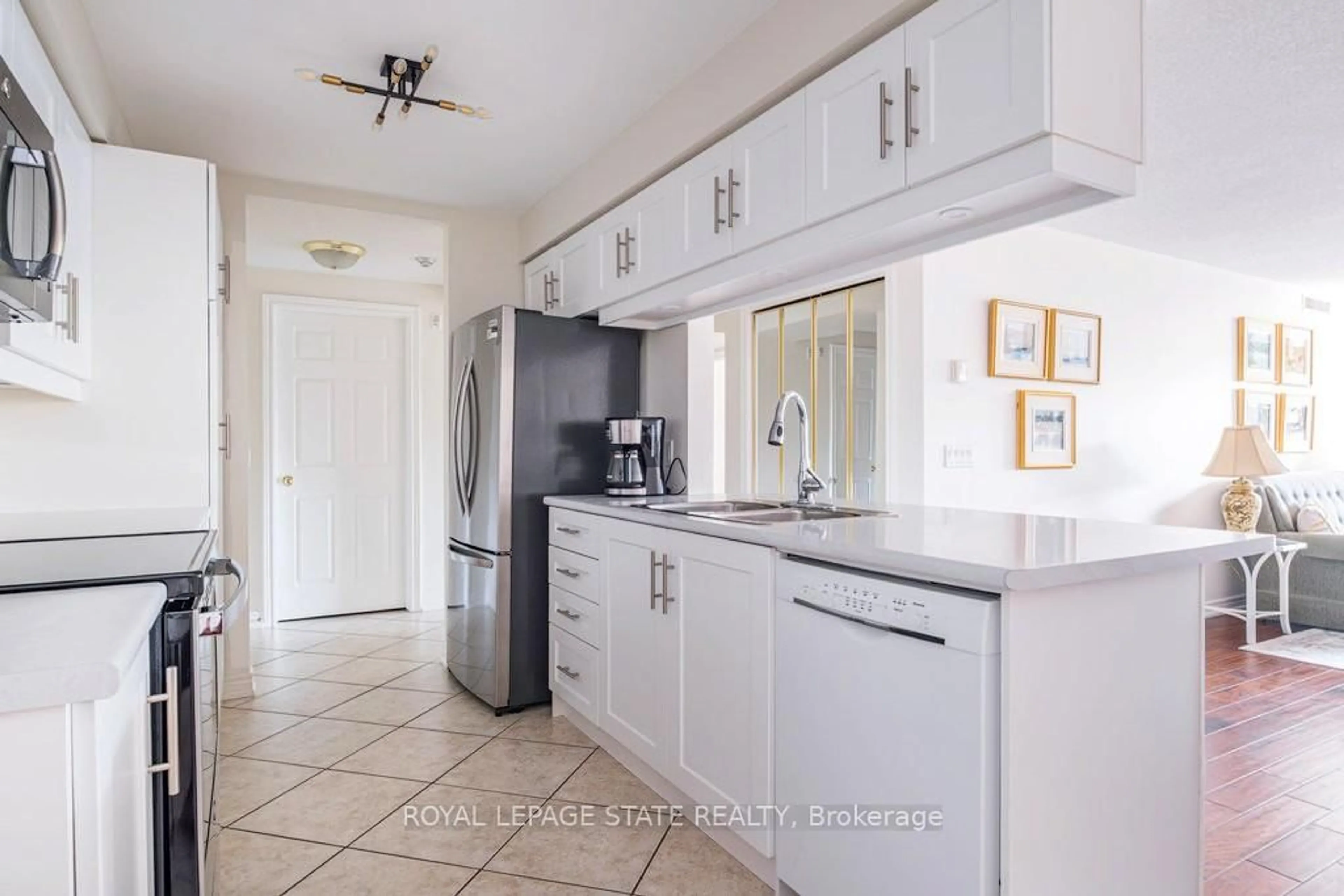 Standard kitchen, ceramic/tile floor for 990 Golf Links Rd #208, Hamilton Ontario L9K 1J8
