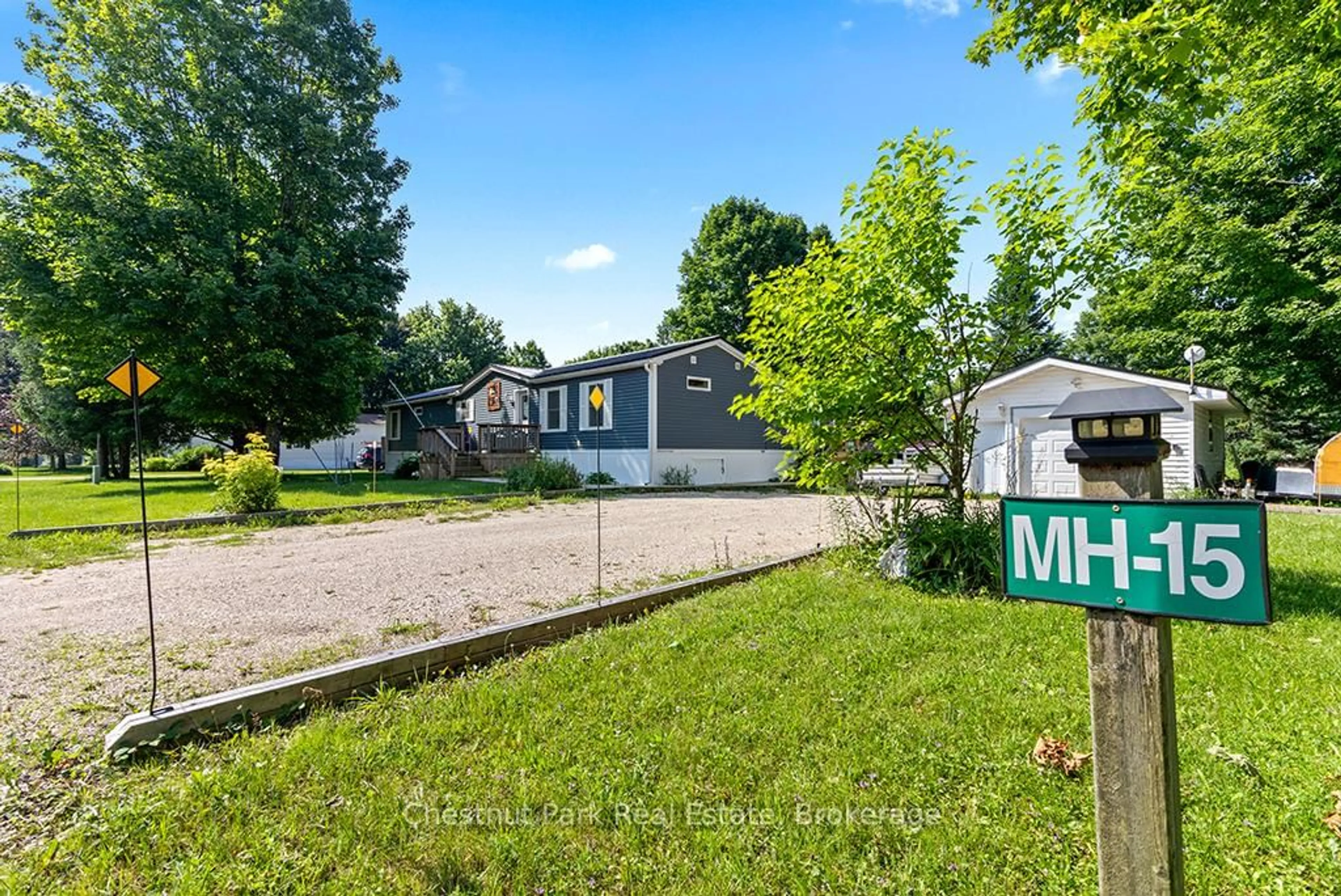 A pic from outside/outdoor area/front of a property/back of a property/a pic from drone, mountain view for 684138 Sideroad 30 #MH15, Chatsworth Ontario N0H 1R0