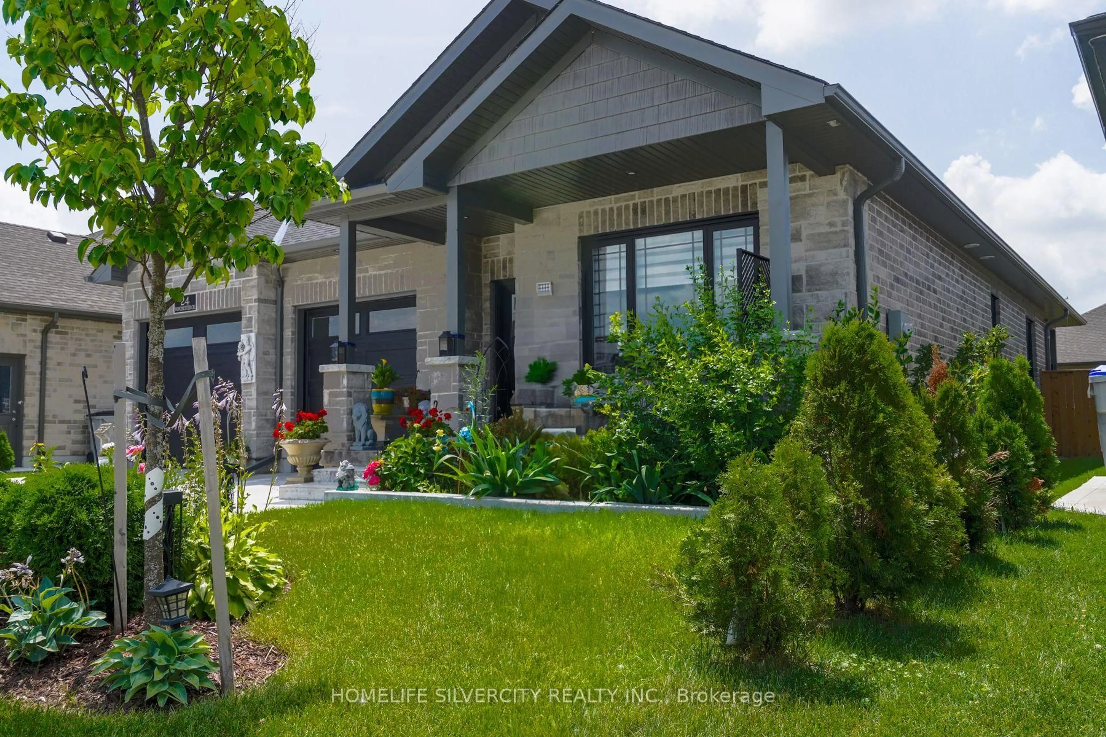 Home with vinyl exterior material, street for 24 Winchester Cres, North Perth Ontario N4W 0J8