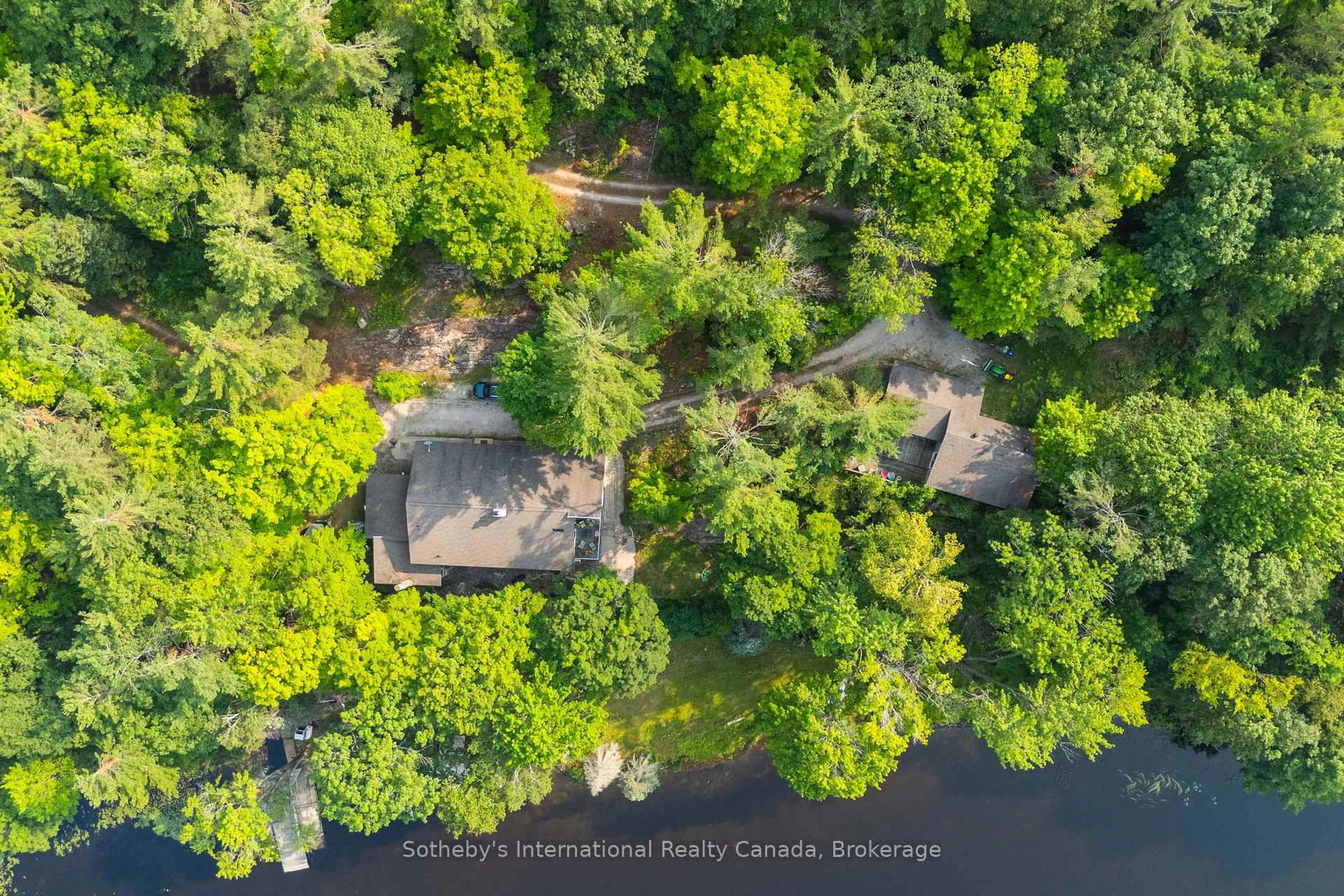A pic from outside/outdoor area/front of a property/back of a property/a pic from drone, water/lake/river/ocean view for 1154 Ridge Rd, Muskoka Lakes Ontario P0C 1M0