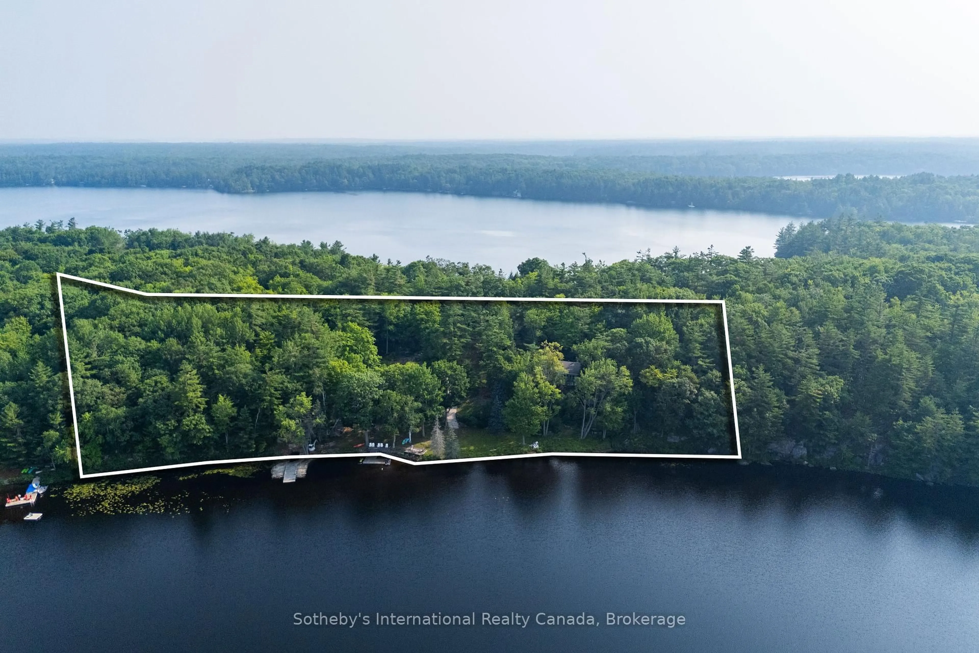 A pic from outside/outdoor area/front of a property/back of a property/a pic from drone, water/lake/river/ocean view for 1154 Ridge Rd, Muskoka Lakes Ontario P0C 1M0