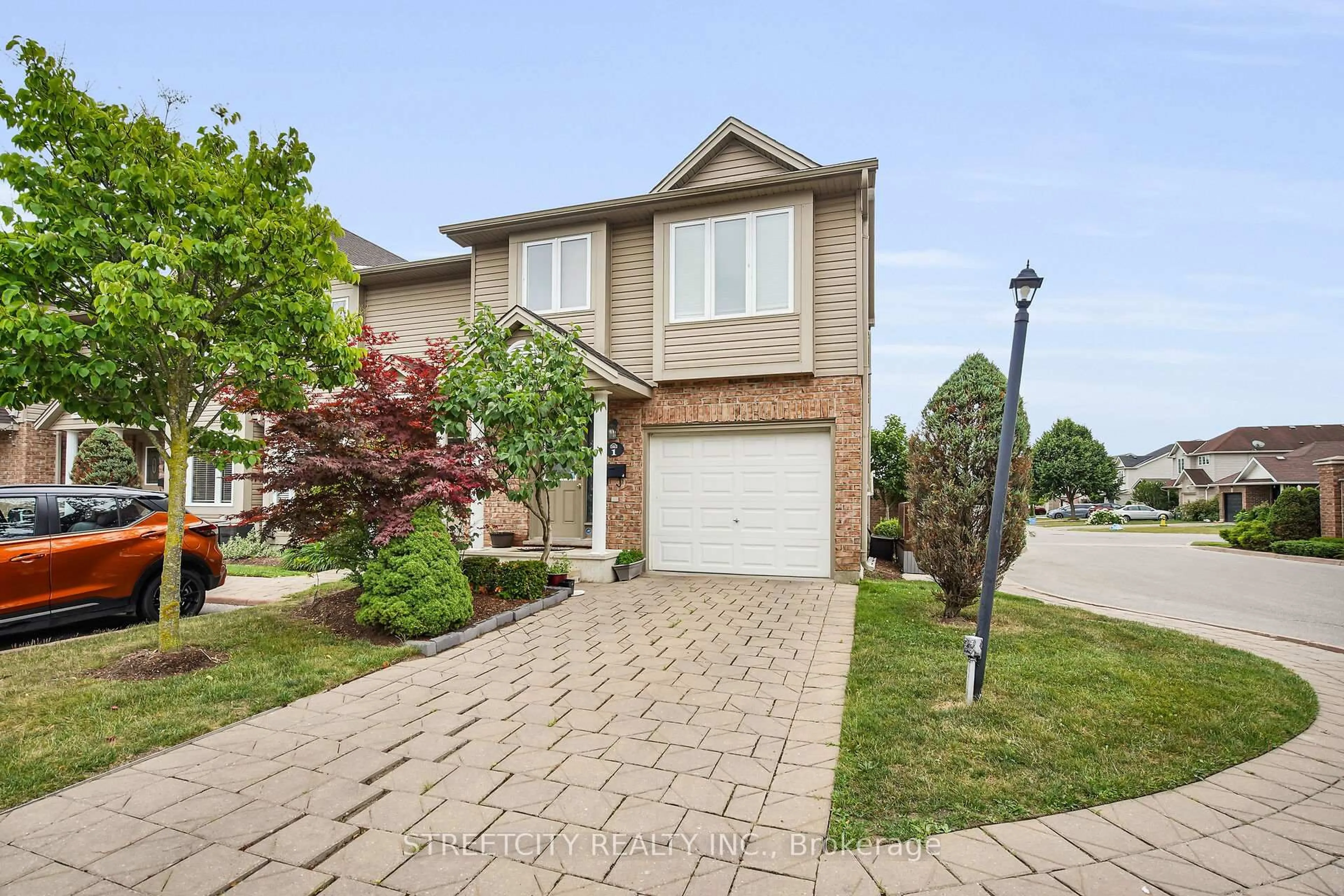 Home with brick exterior material, street for 1320 Savannah Dr #1, London North Ontario N5X 0B7