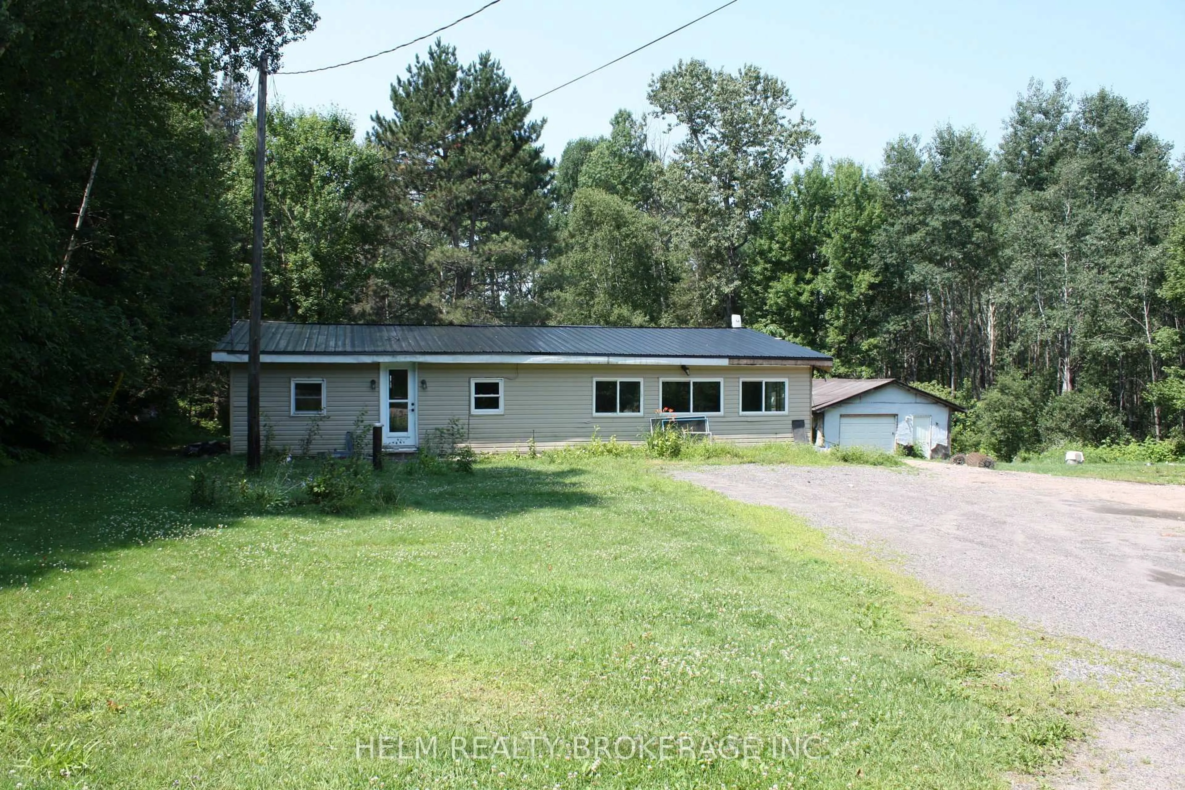 A pic from outside/outdoor area/front of a property/back of a property/a pic from drone, unknown for 405 McNutt Rd, Bonfield Ontario P0H 2E0