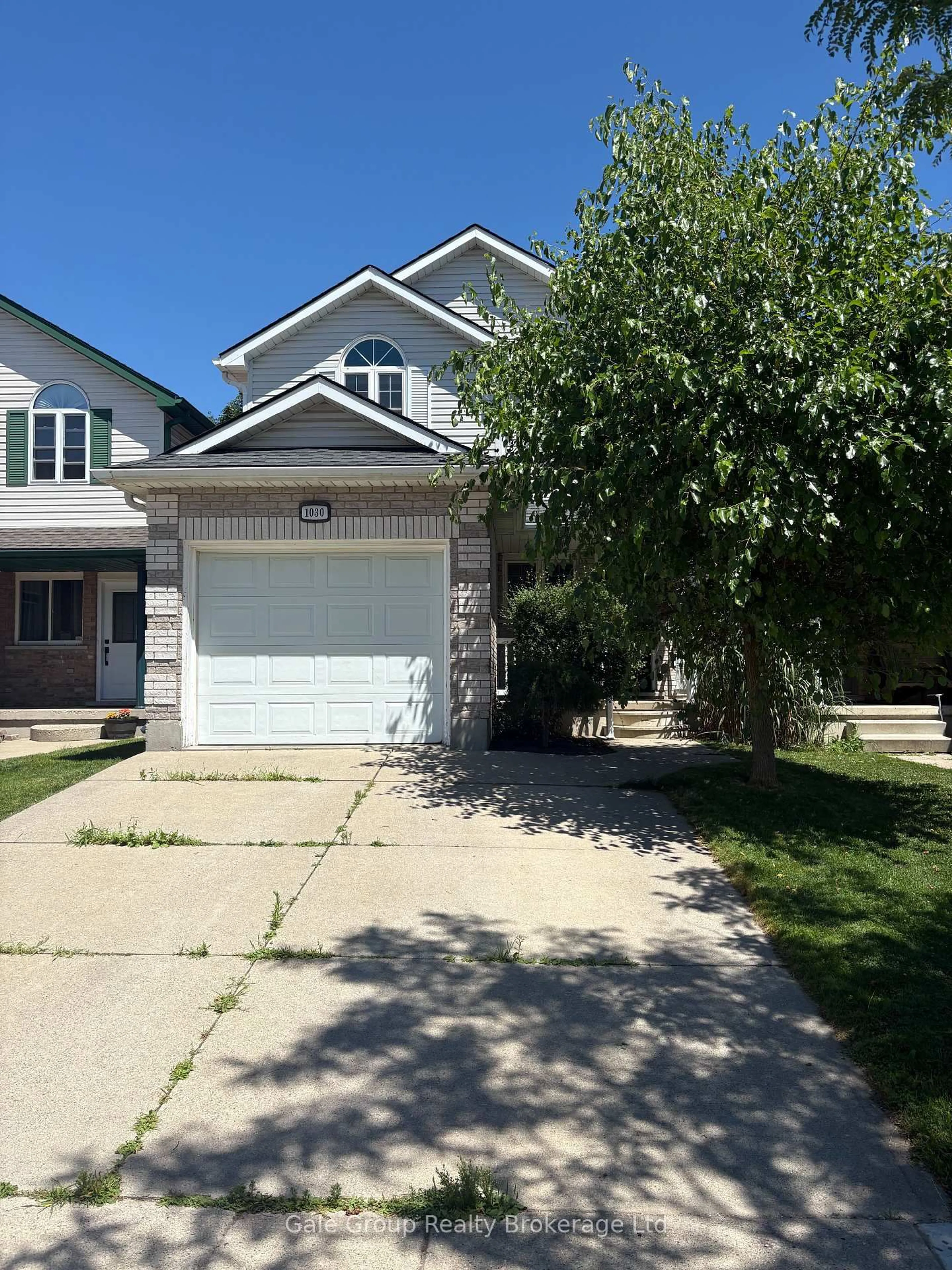 Home with vinyl exterior material, street for 1030 Pearson Dr, Woodstock Ontario N4S 8V1