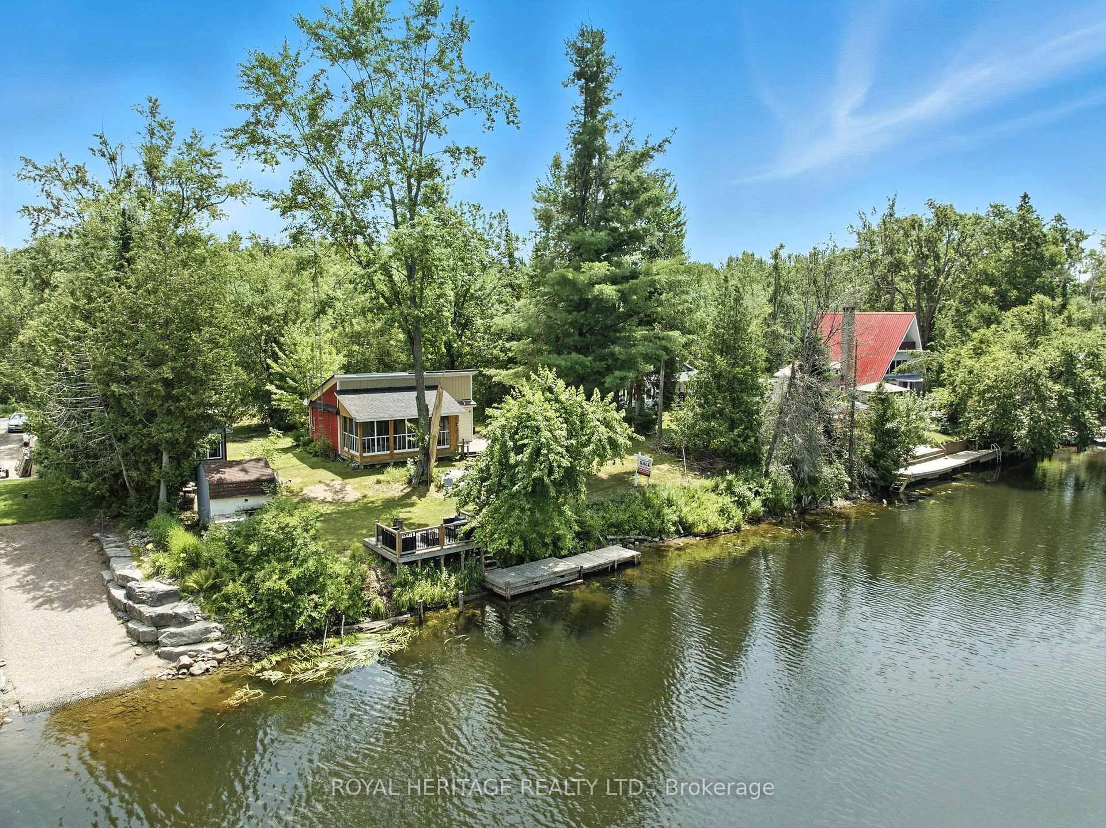 A pic from outside/outdoor area/front of a property/back of a property/a pic from drone, water/lake/river/ocean view for 143 Fell Station Dr, Kawartha Lakes Ontario K0M 1N0