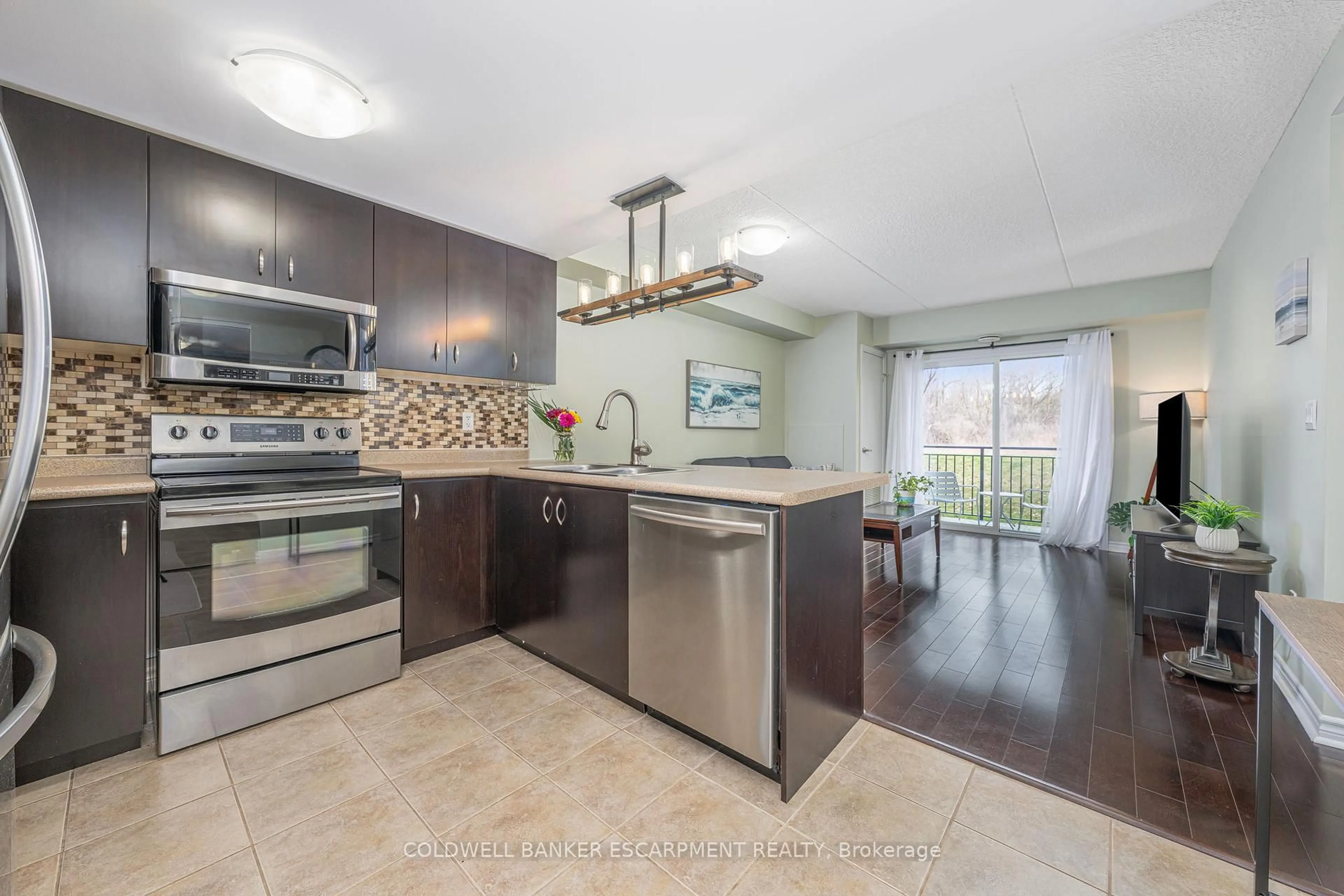 Open concept kitchen, unknown for 43 Goodwin Dr #109, Guelph Ontario N1L 0E8