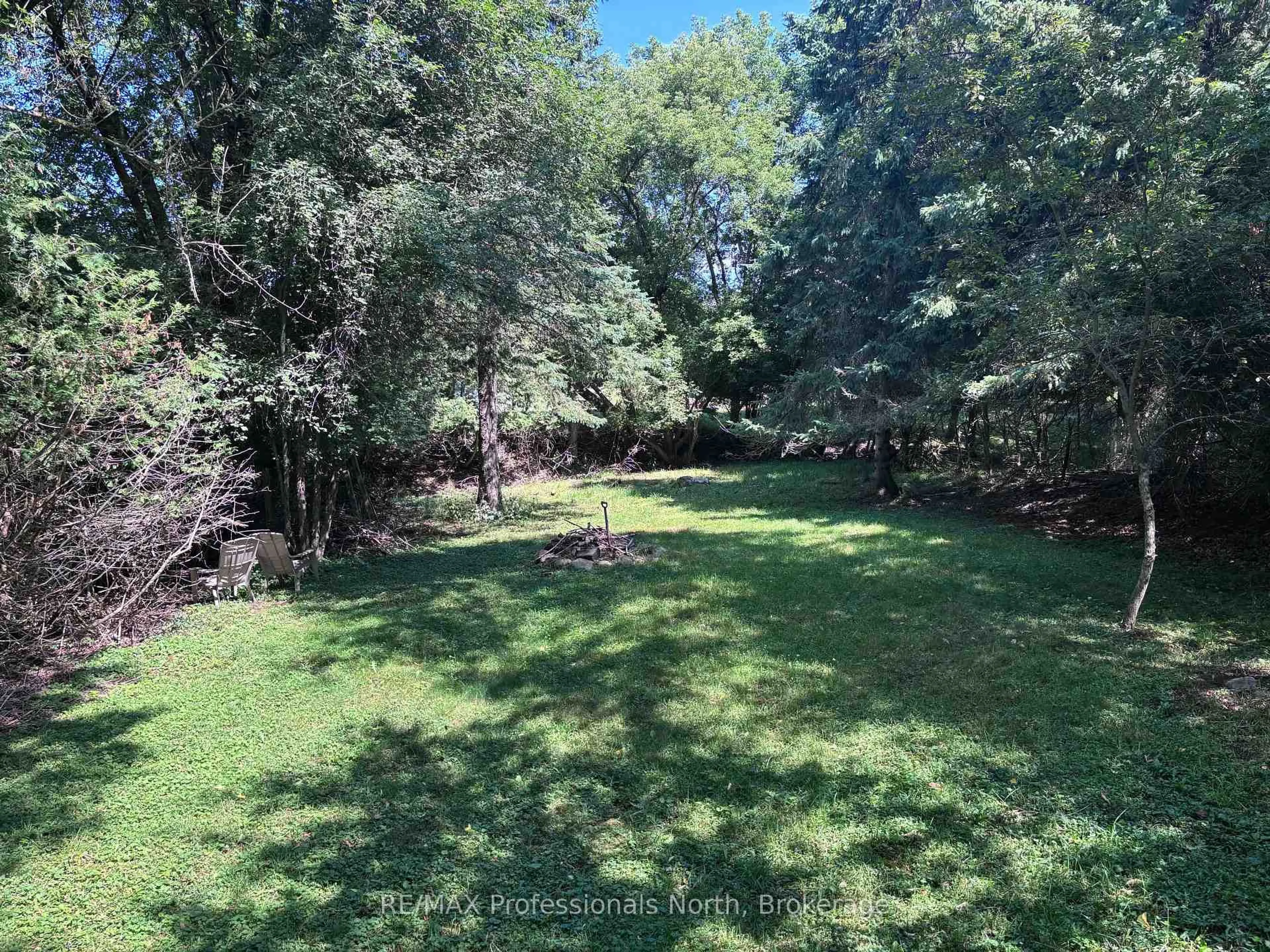 A pic from outside/outdoor area/front of a property/back of a property/a pic from drone, forest/trees view for 259 Highland St, Dysart et al Ontario K0M 1S0