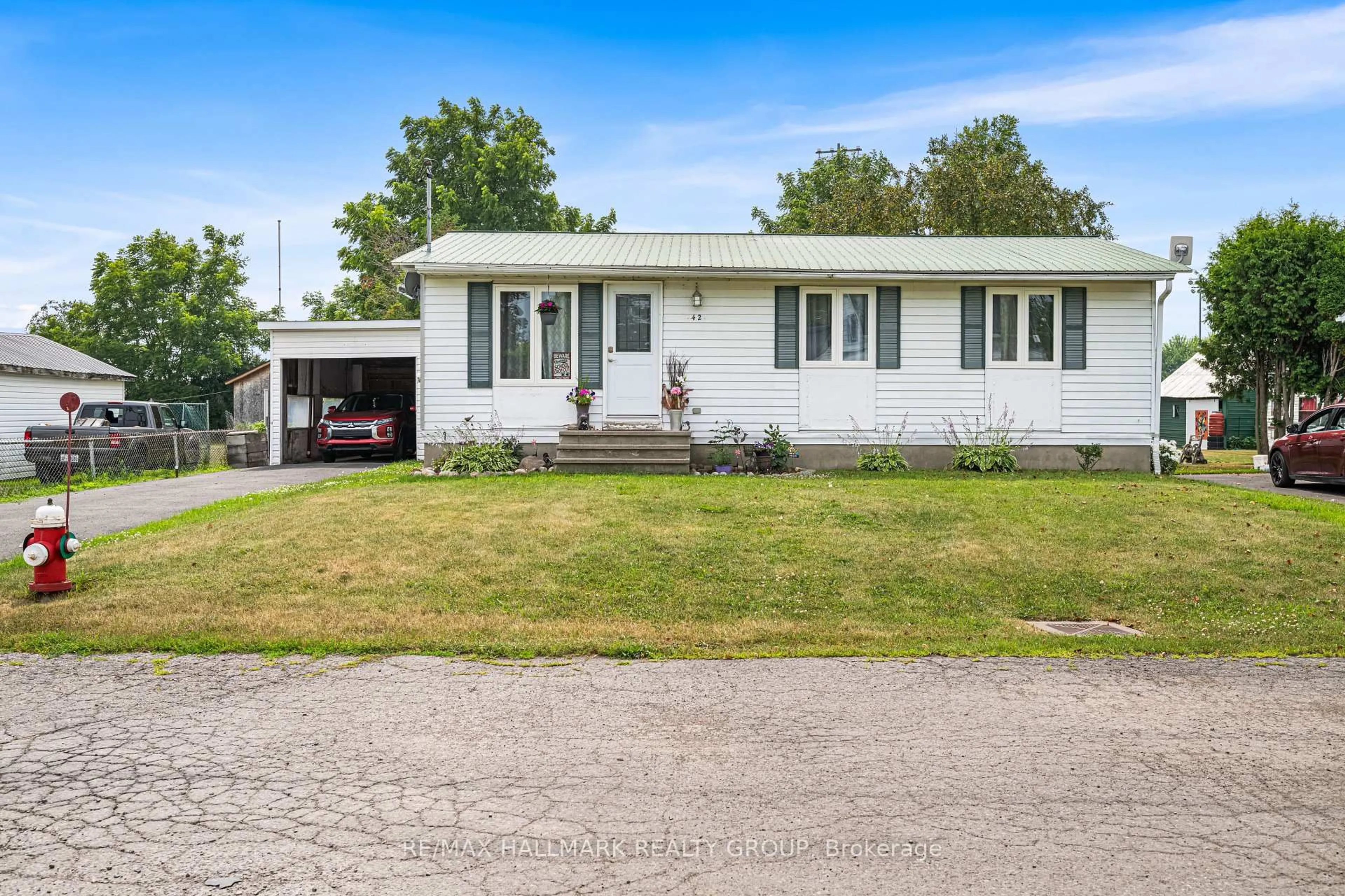 Home with vinyl exterior material, street for 42 HARPER St, North Dundas Ontario K0C 1H0