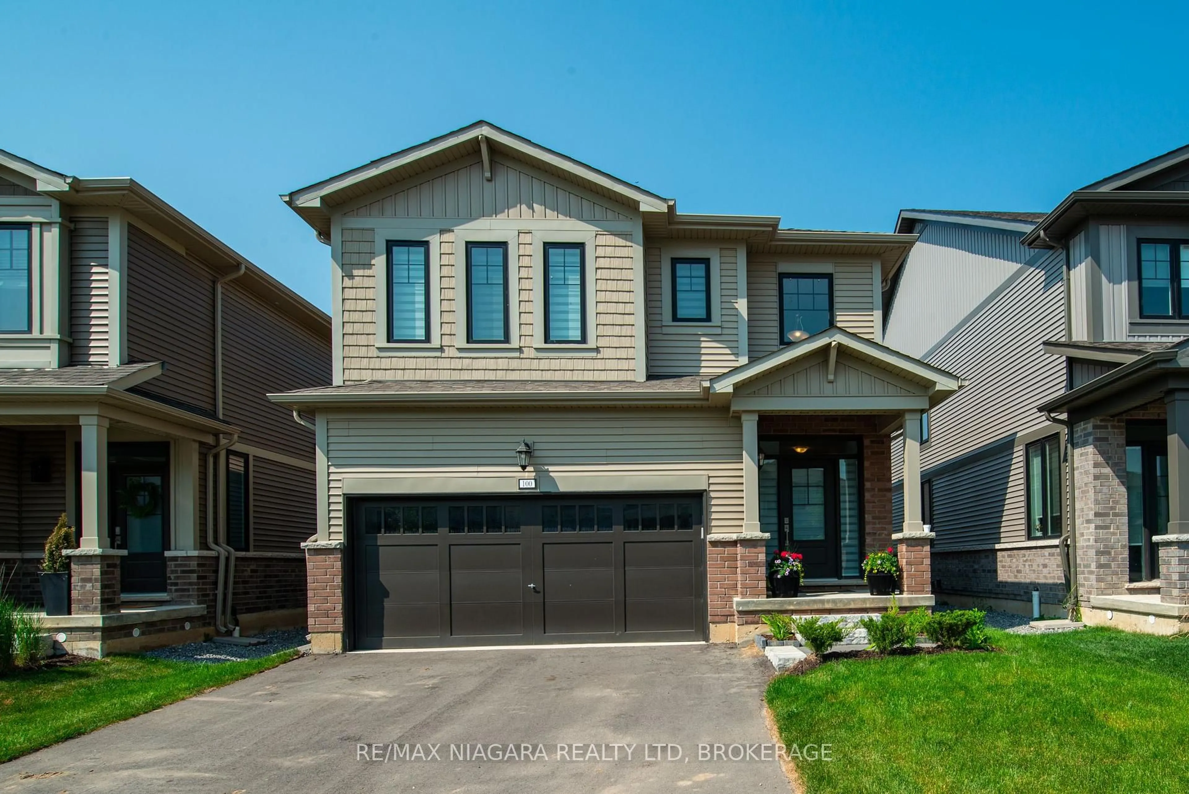 Home with brick exterior material, street for 100 Blackbird Way, Hamilton Ontario L0R 1W0