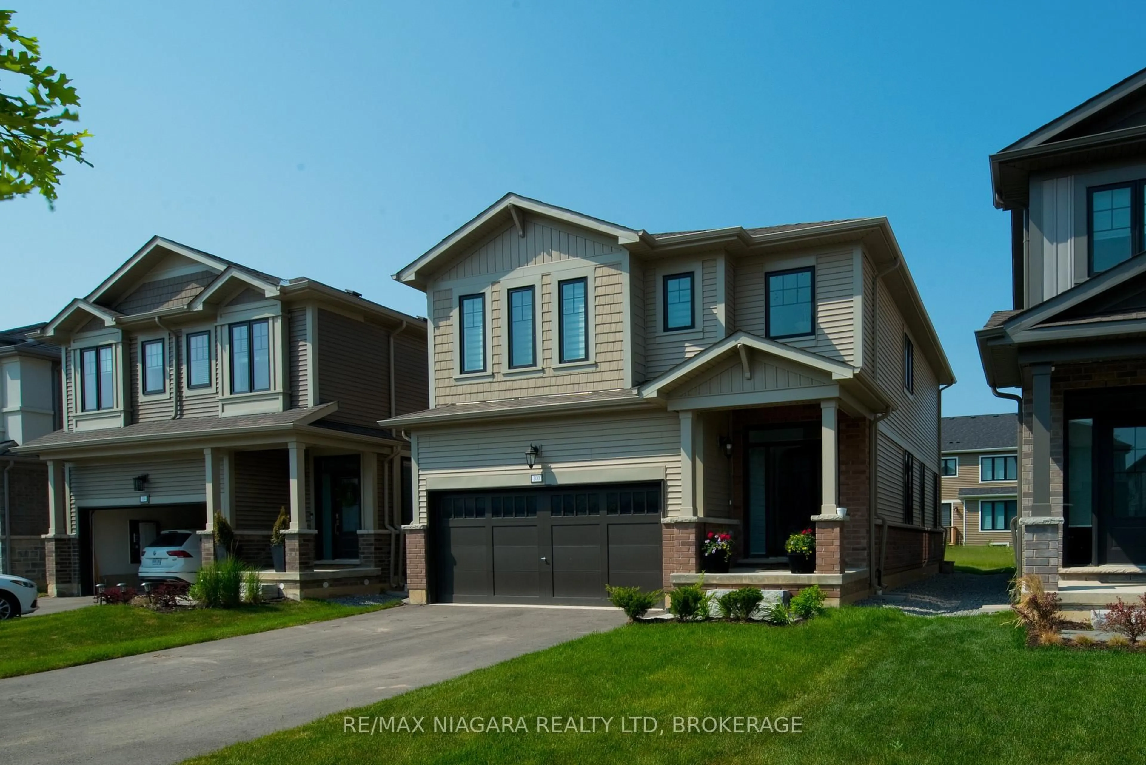 Home with brick exterior material, street for 100 Blackbird Way, Hamilton Ontario L0R 1W0