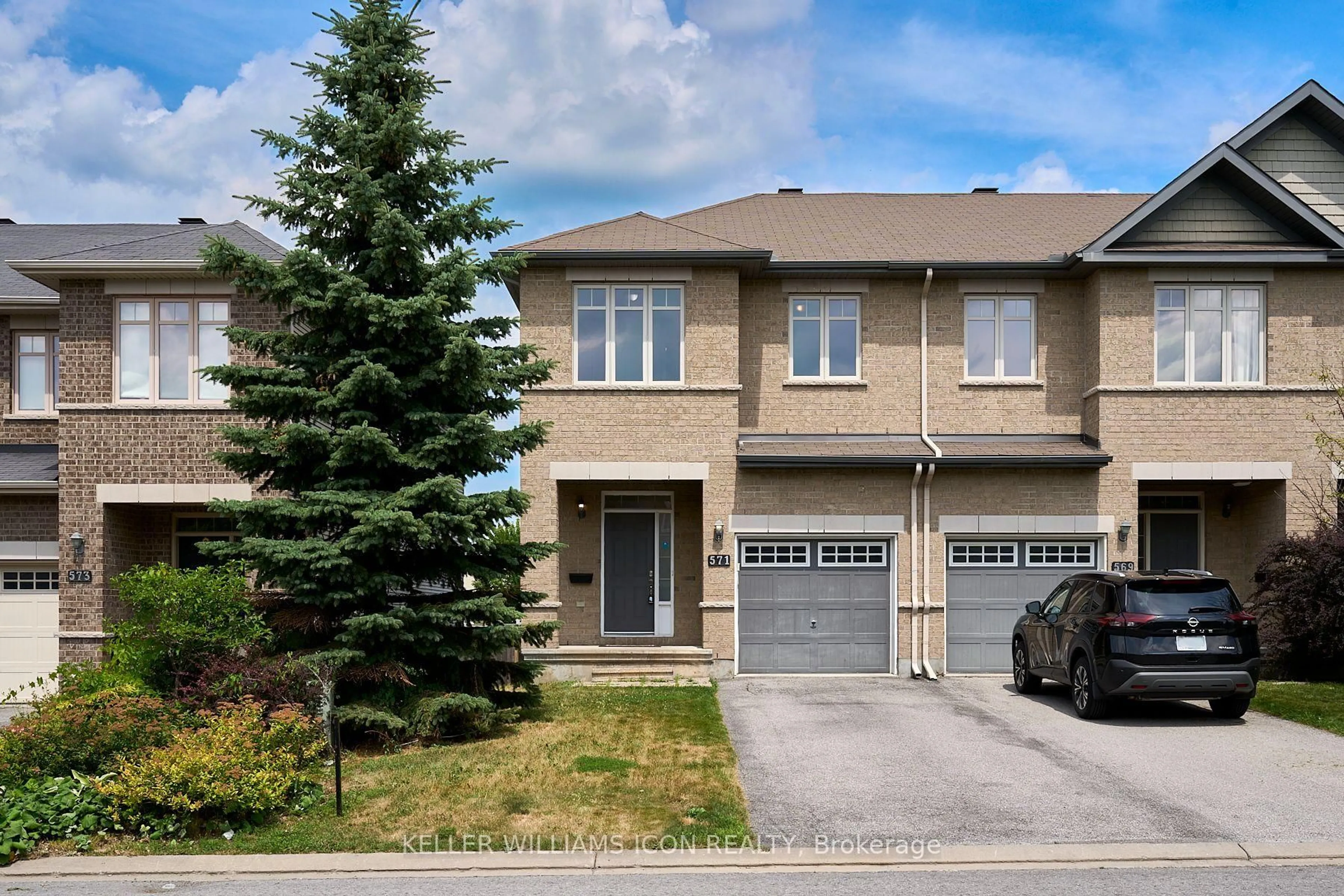 Home with brick exterior material, street for 571 Remnor Ave, Ottawa Ontario K2T 0A5