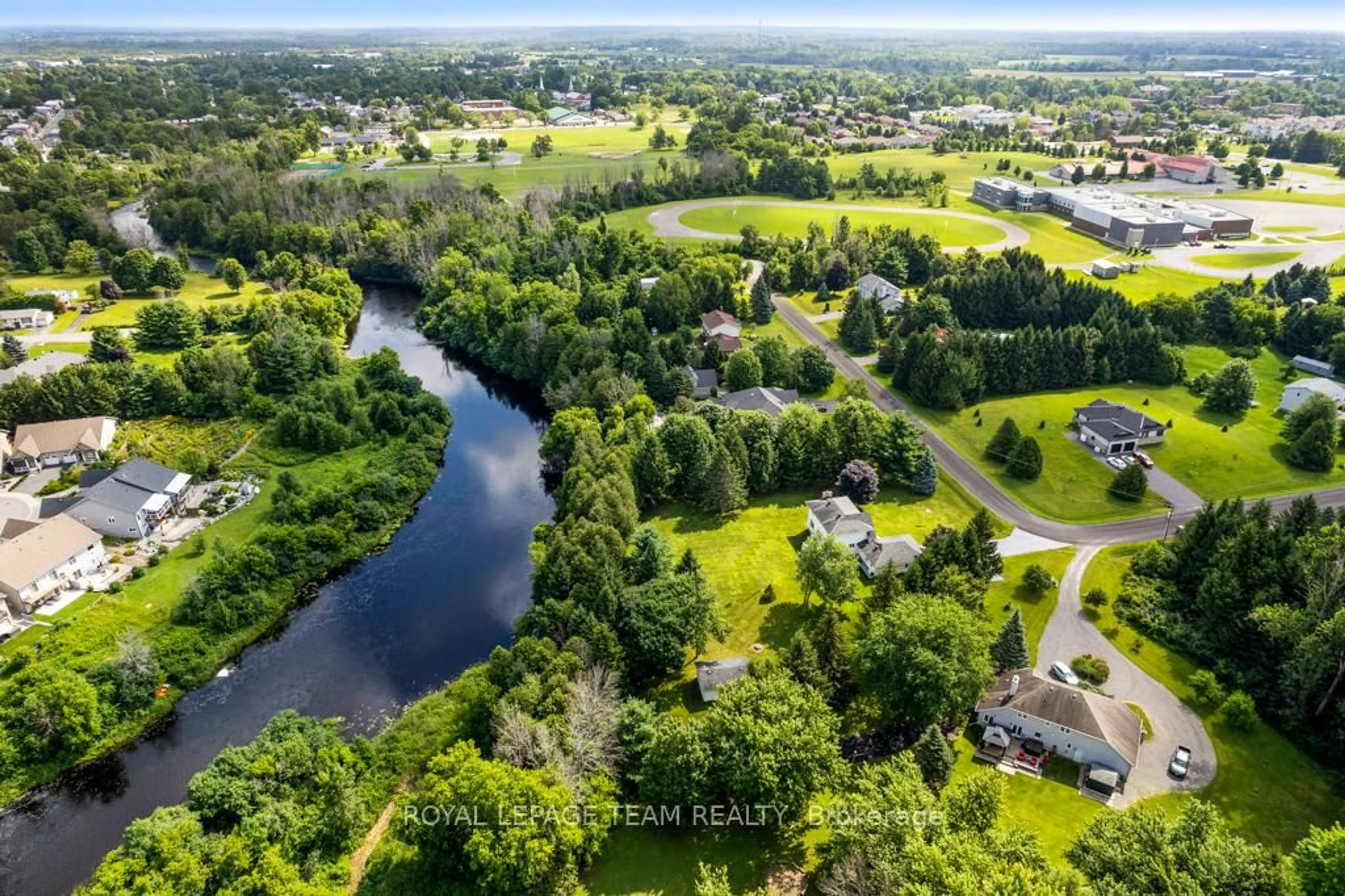 A pic from outside/outdoor area/front of a property/back of a property/a pic from drone, water/lake/river/ocean view for 17 MARIC Tr, North Grenville Ontario K0G 1J0