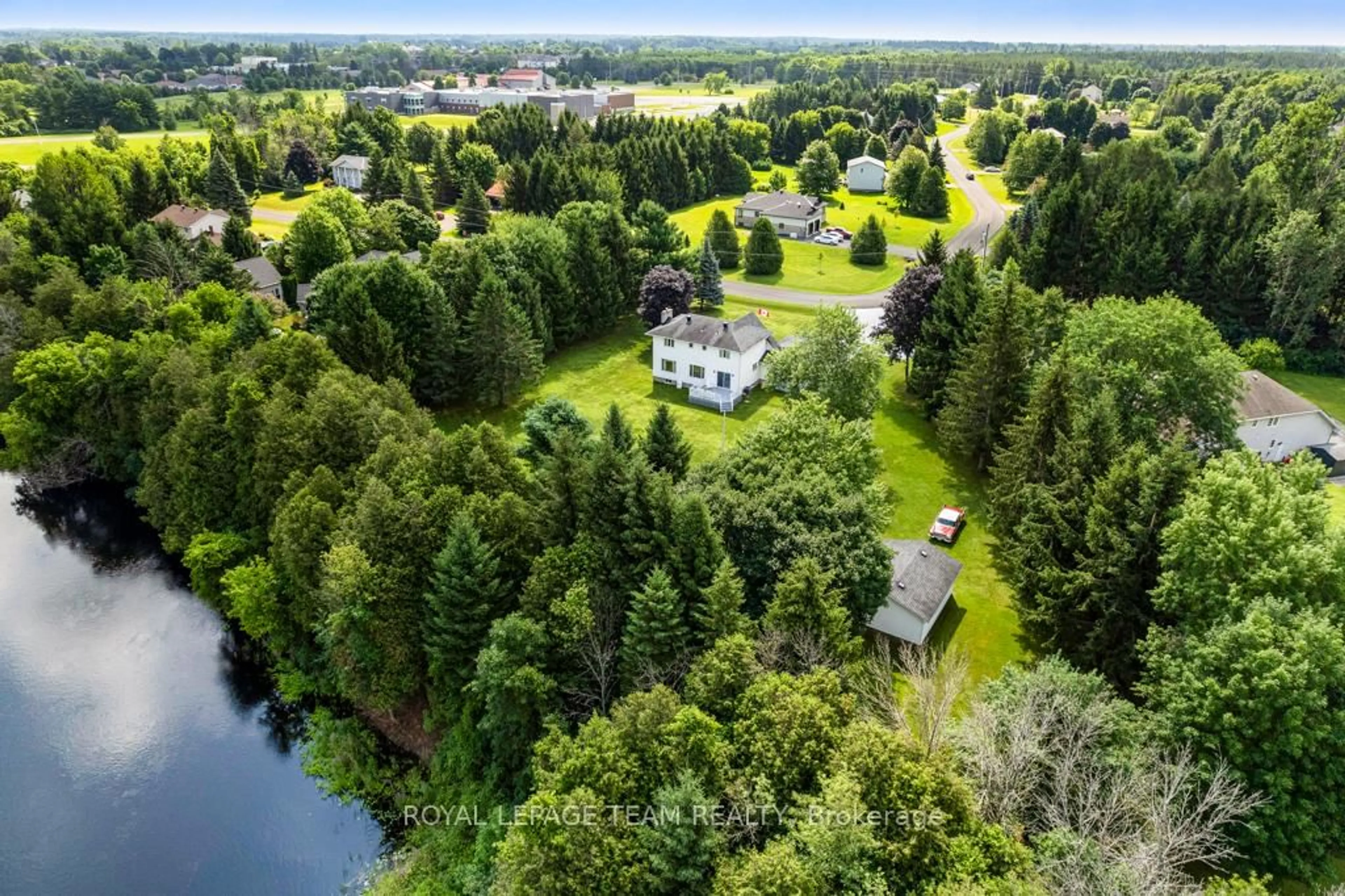 A pic from outside/outdoor area/front of a property/back of a property/a pic from drone, water/lake/river/ocean view for 17 MARIC Tr, North Grenville Ontario K0G 1J0
