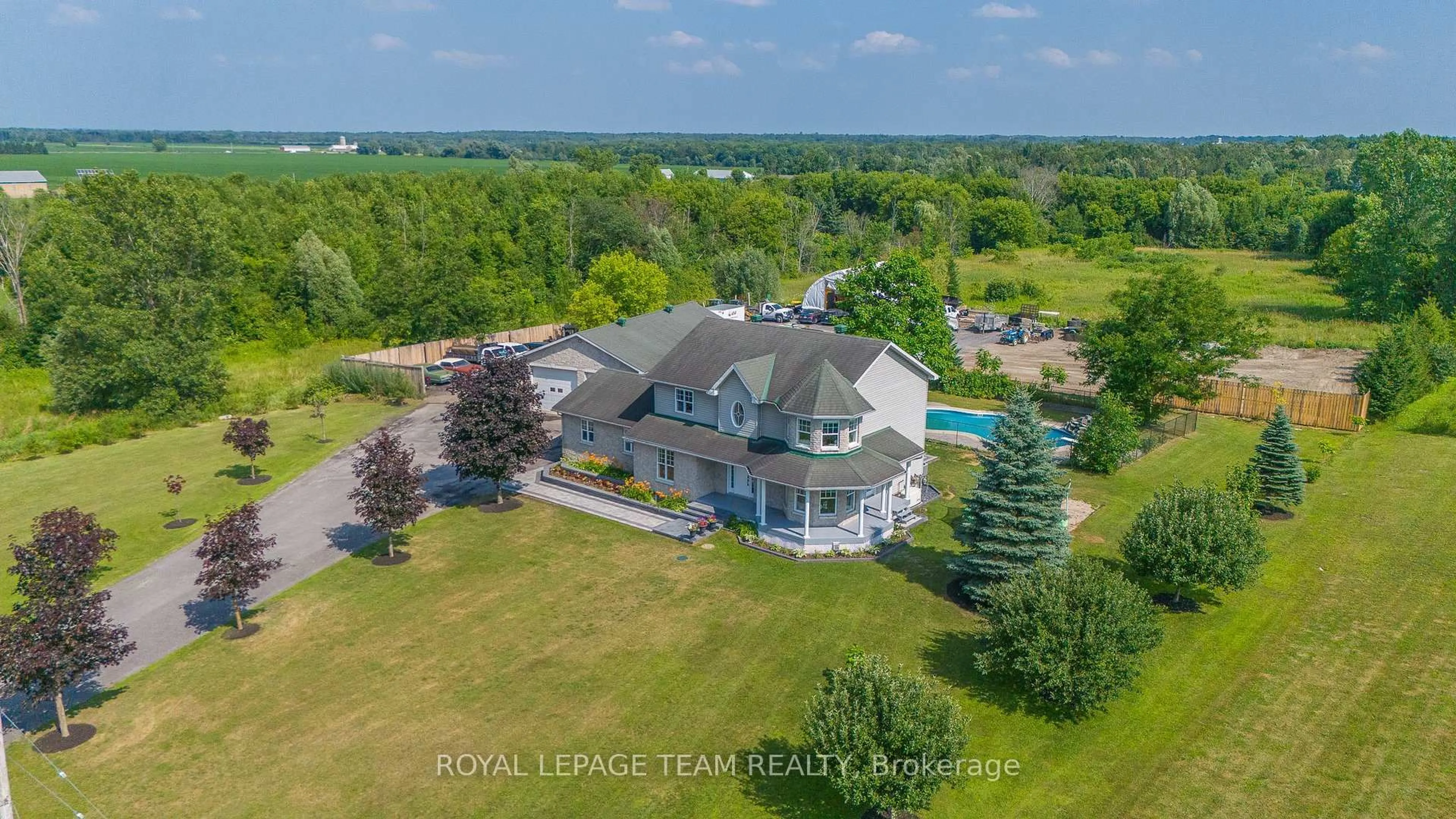 A pic from outside/outdoor area/front of a property/back of a property/a pic from drone, water/lake/river/ocean view for 7474 Mitch Owens Rd, Ottawa Ontario K4P 1K9