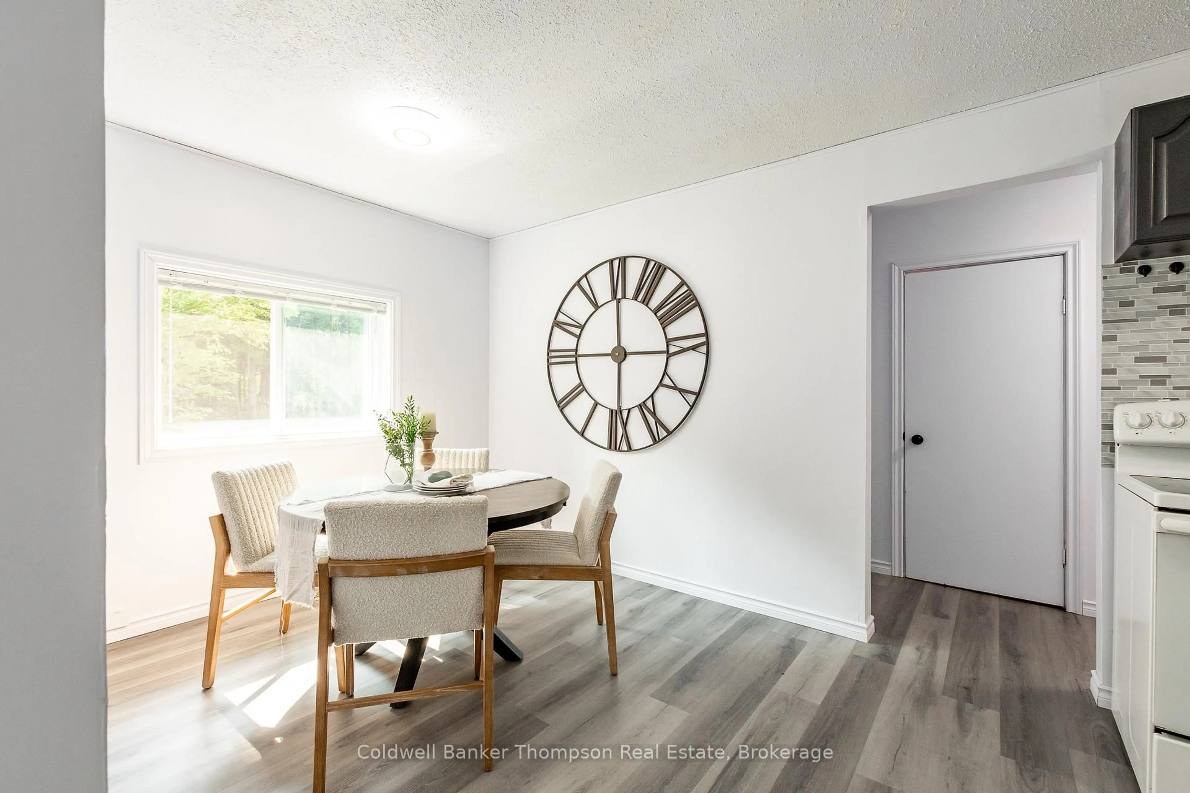 Dining room, wood/laminate floor for 1980 Lone Pine Dr, Huntsville Ontario P0B 1L0