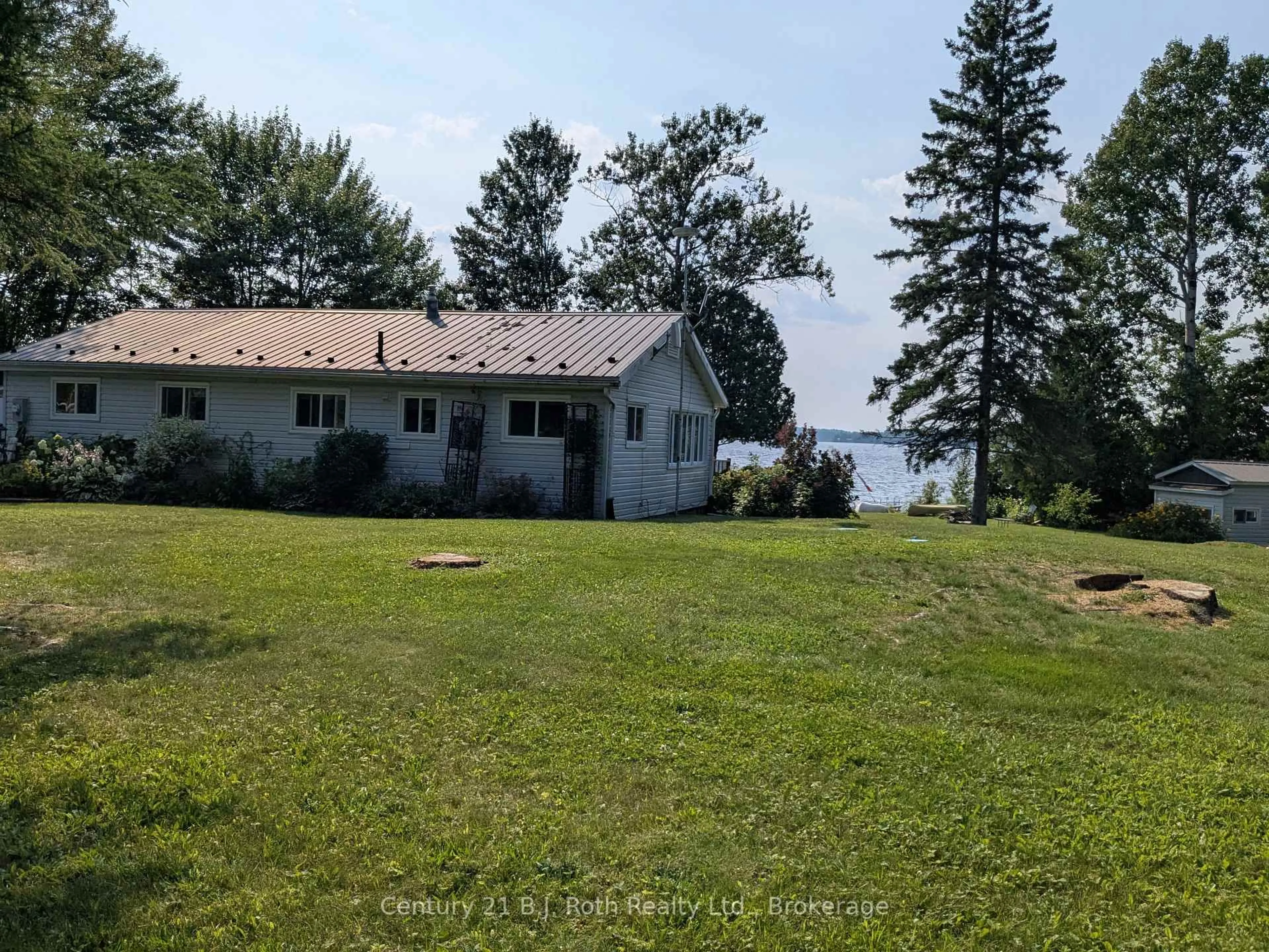 A pic from outside/outdoor area/front of a property/back of a property/a pic from drone, water/lake/river/ocean view for 80 Islandview Lane, Chisholm Ontario P0H 1Z0