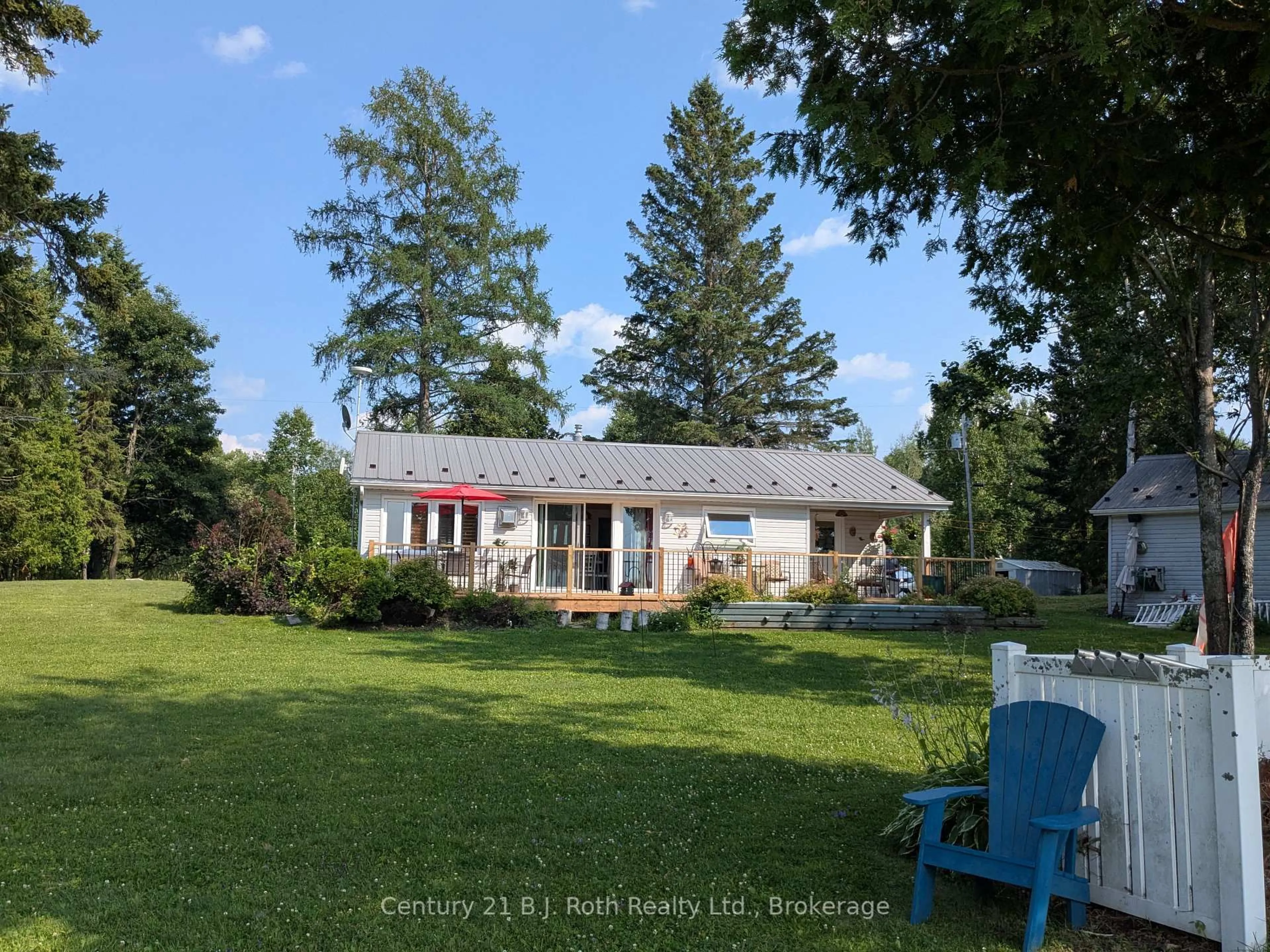 A pic from outside/outdoor area/front of a property/back of a property/a pic from drone, water/lake/river/ocean view for 80 Islandview Lane, Chisholm Ontario P0H 1Z0