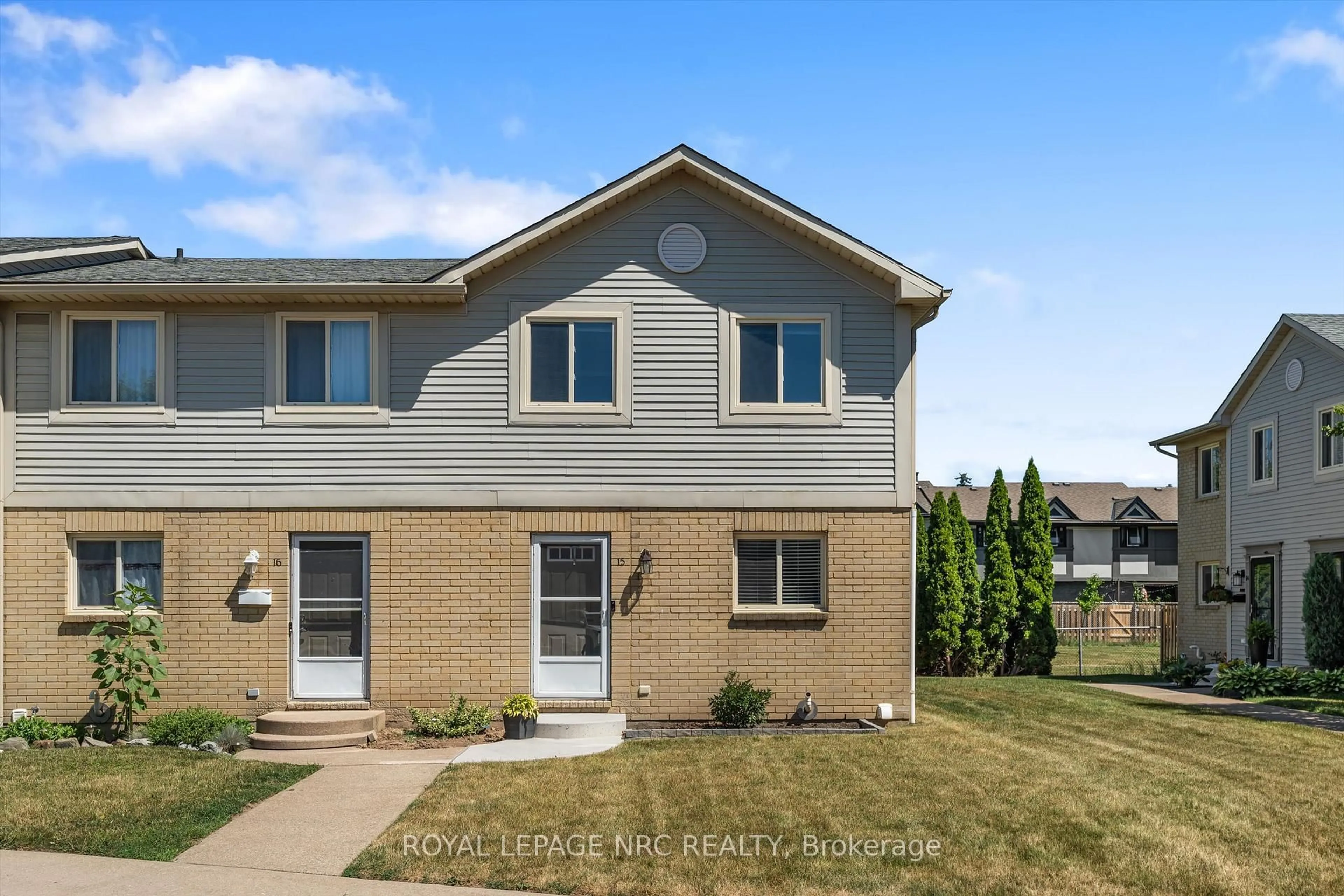 Home with vinyl exterior material, street for 65 Dorchester Blvd #15, St. Catharines Ontario L2M 7T3