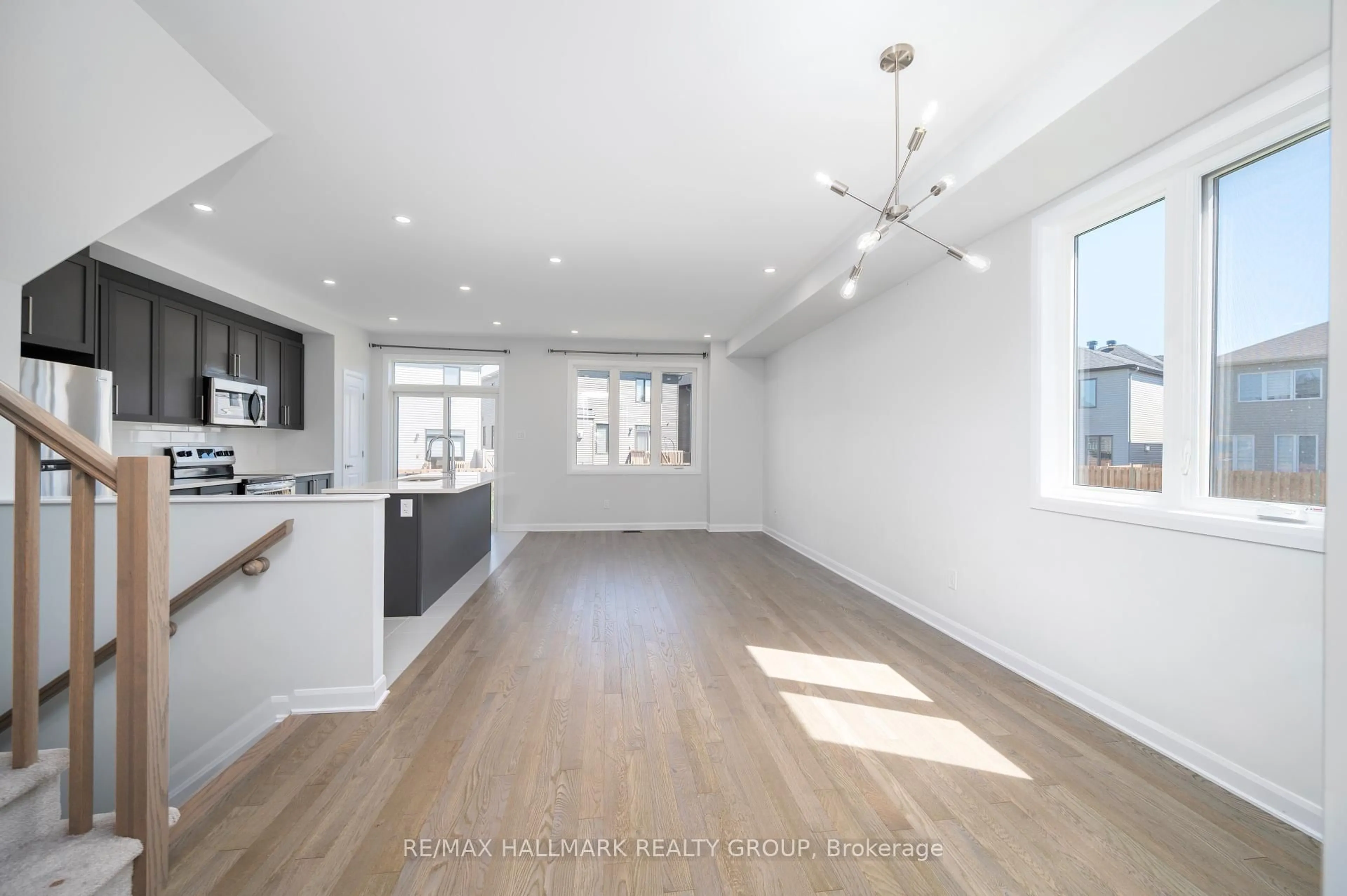 Open concept kitchen, wood/laminate floor for 315 Blossom Pass Terr, Ottawa Ontario K4A 5P1
